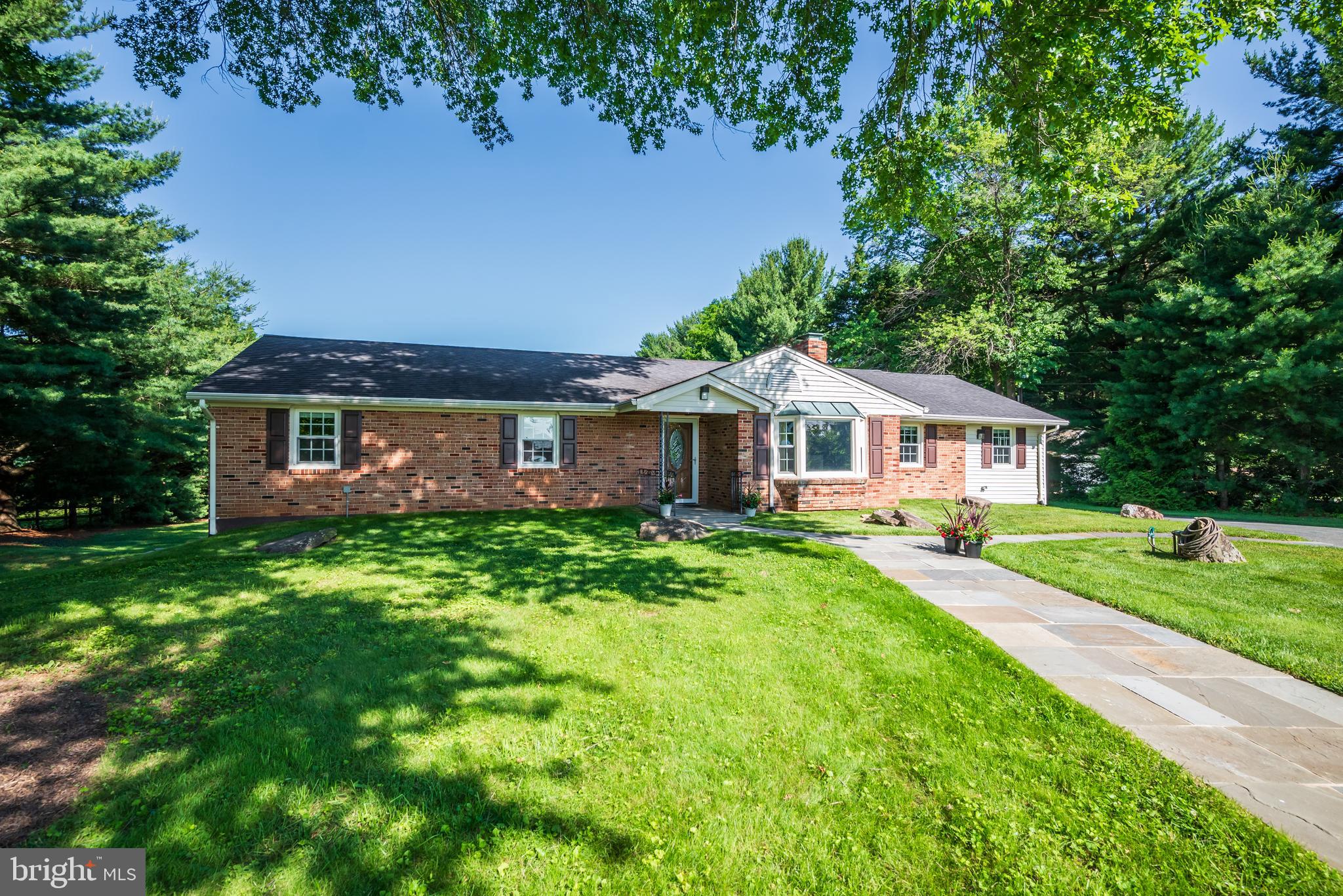21020 Peach Tree Road Dickerson, MD 20842 - Photo 55 of 57 a front view of a house with yard and green space