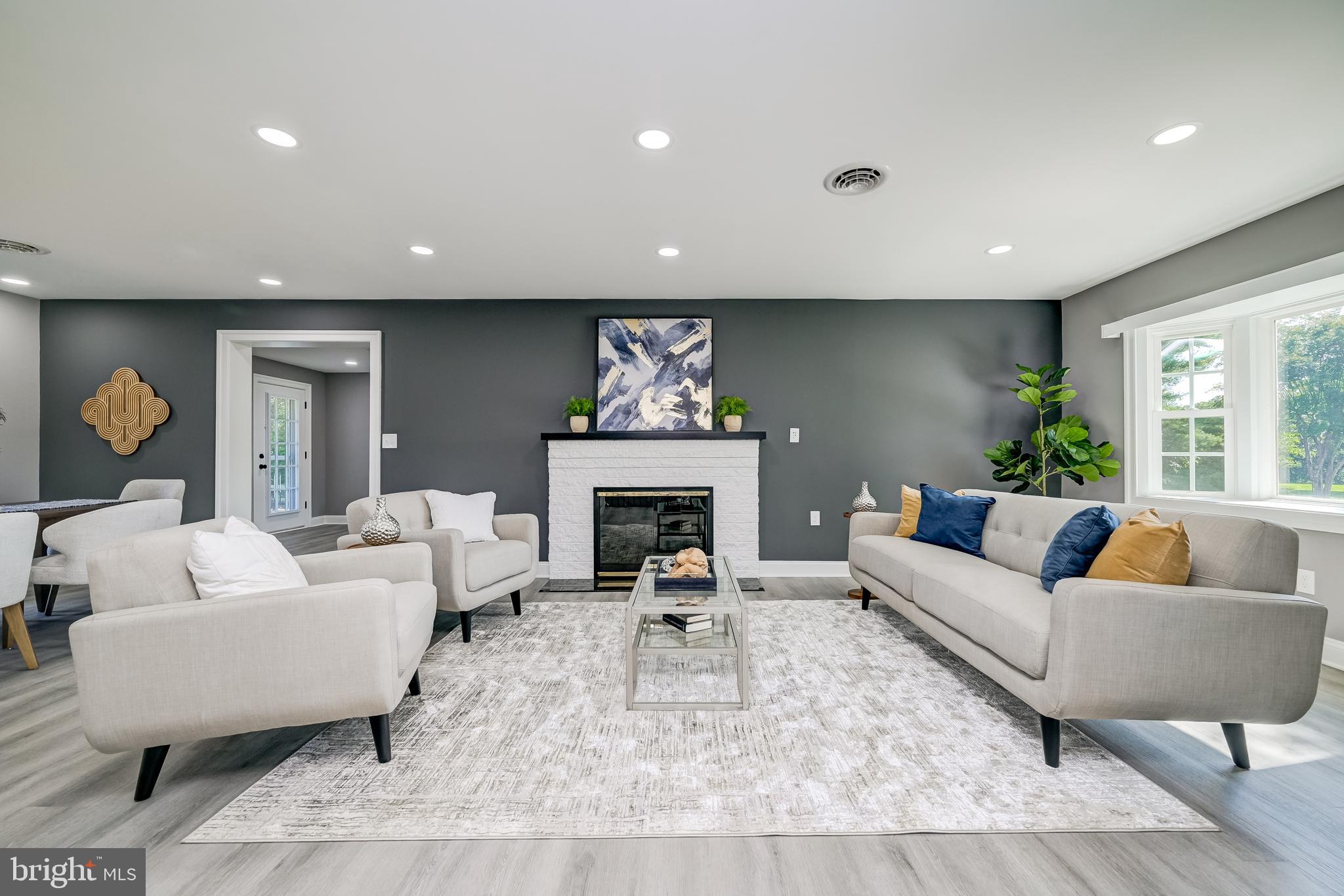 21020 Peach Tree Road Dickerson, MD 20842 - Photo 6 of 57 a living room with furniture and a fireplace