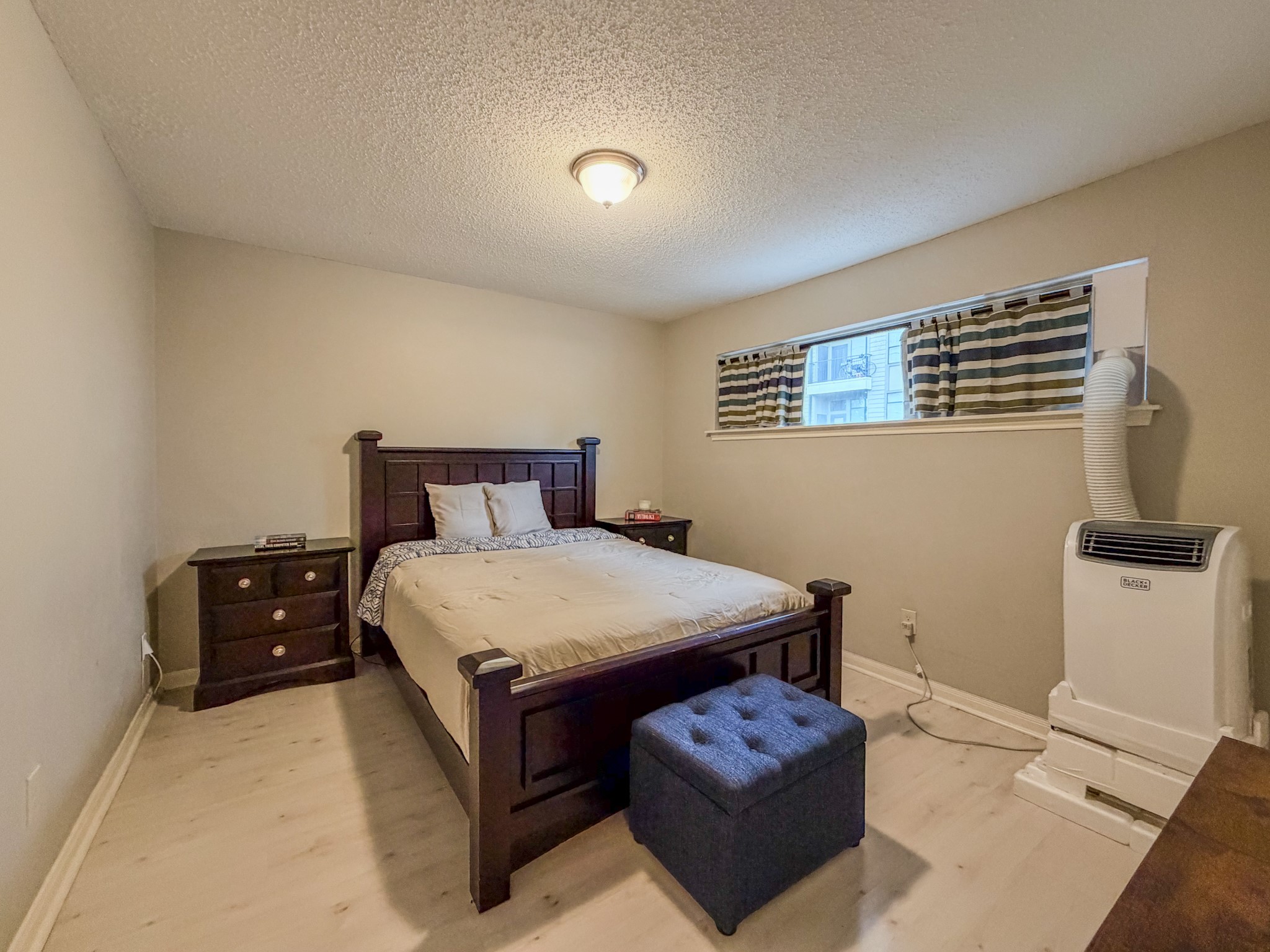 2574 Marilee Lane, Unit 23 Houston, TX 77057 - Photo 12 of 22 Enjoy year-round comfort with central A/C plus an additional wall unit.