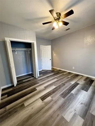 a bathroom with a sink a toilet and bathtub