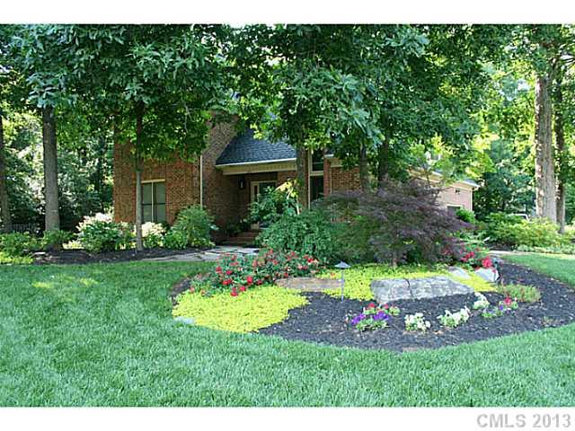 245 South Downs Way, Unit 49 Fort Mill, SC 29708 - Photo 11 of 16 a view of a house with a yard and potted plants