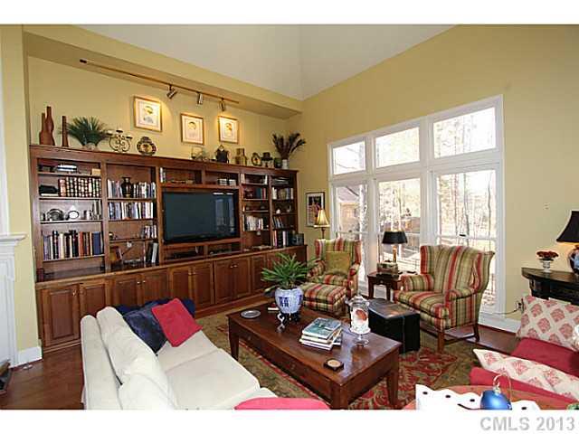 245 South Downs Way, Unit 49 Fort Mill, SC 29708 - Photo 7 of 16 a living room with furniture and a flat screen tv