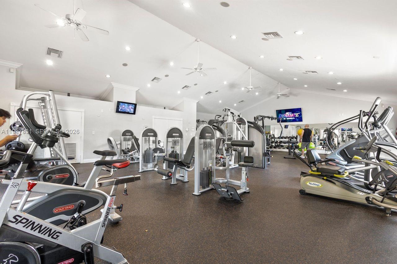 18551 Woodstream Drive Boca Raton, FL 33498 - Photo 27 of 27 a view of a room with gym equipment