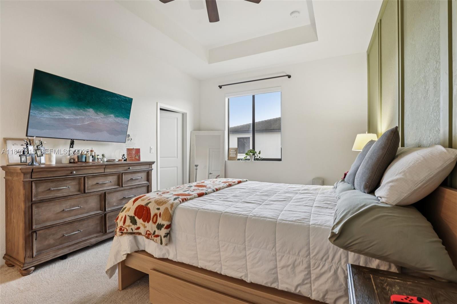 23291 Southwest 110th Court Homestead, FL 33032 - Photo 17 of 41 a bedroom with a bed and furniture