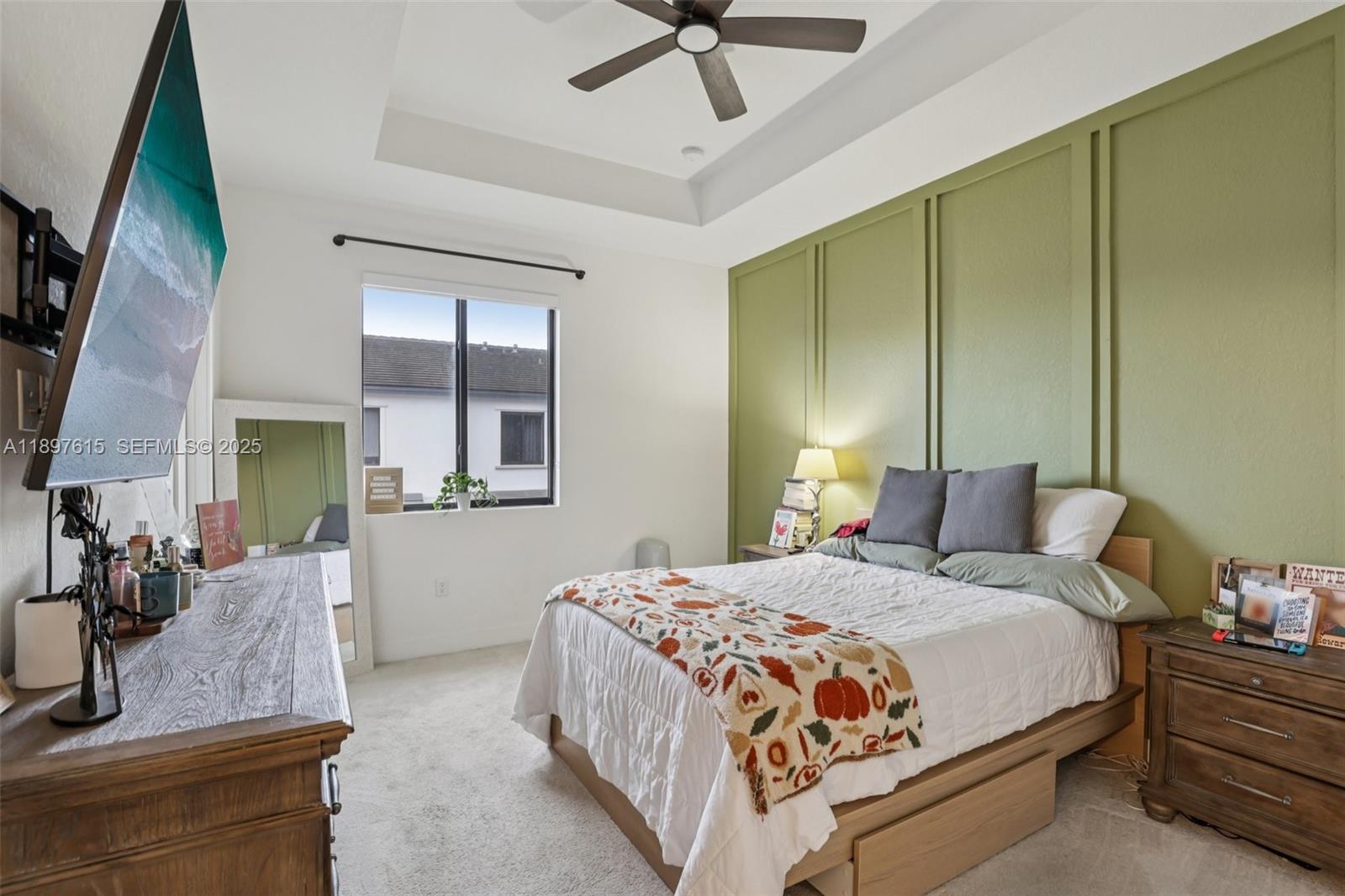 23291 Southwest 110th Court Homestead, FL 33032 - Photo 24 of 41 a bedroom with a bed window and couch