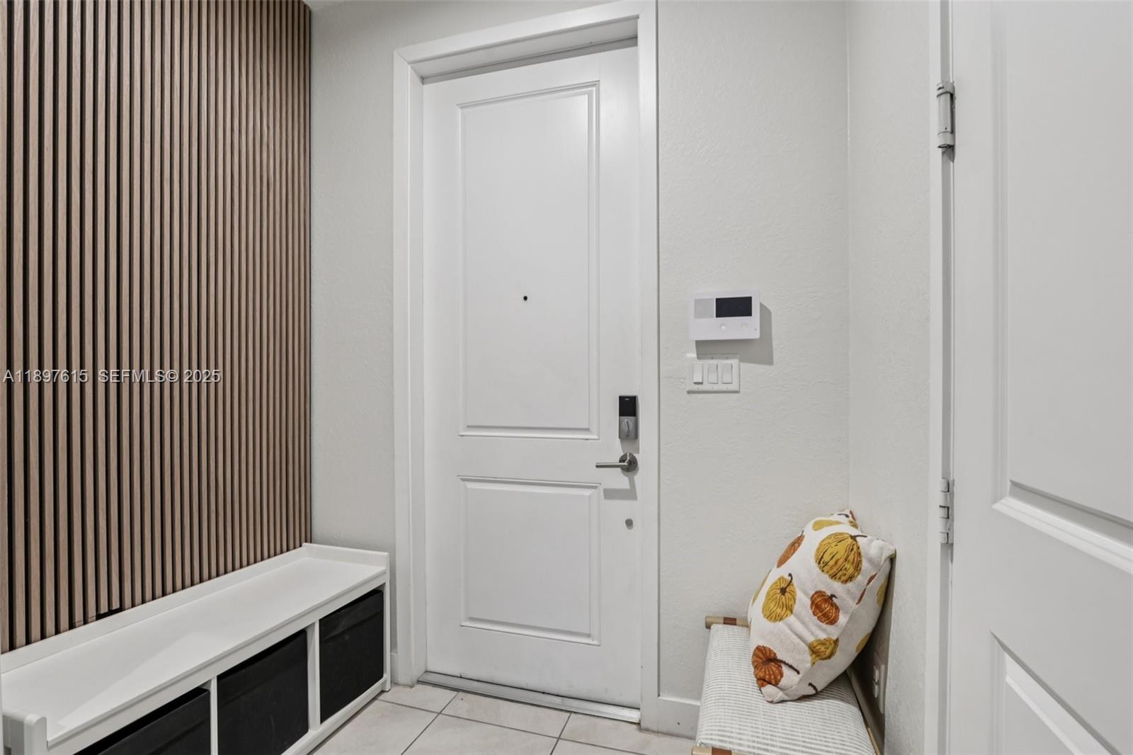 23291 Southwest 110th Court Homestead, FL 33032 - Photo 3 of 41 a bedroom with a bed and a window