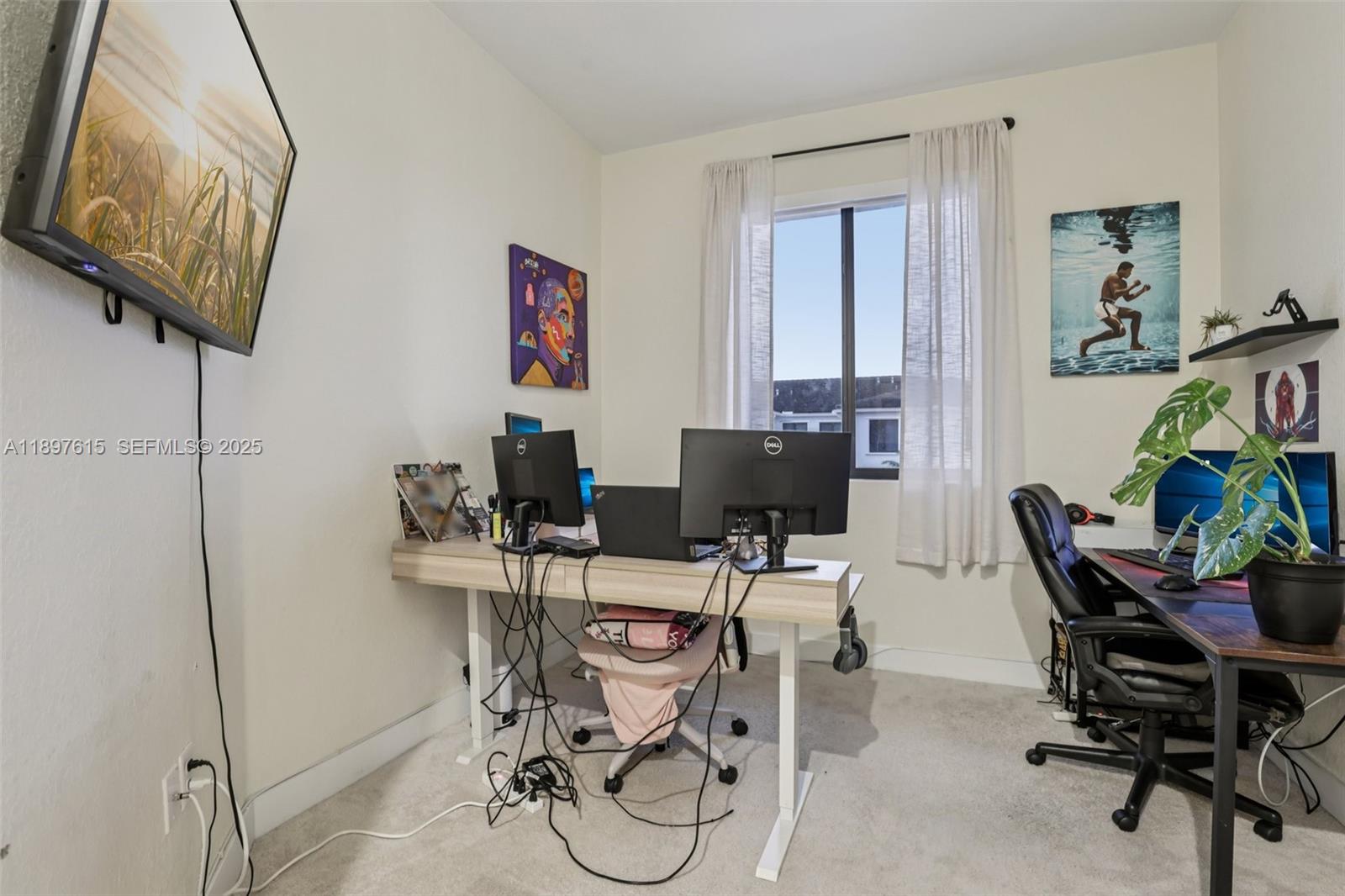 23291 Southwest 110th Court Homestead, FL 33032 - Photo 34 of 41 a view of a workspace with furniture and a window