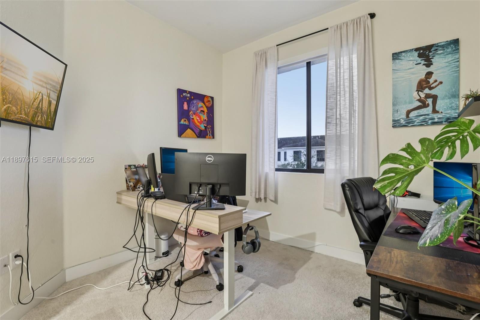 23291 Southwest 110th Court Homestead, FL 33032 - Photo 35 of 41 a view of a workspace with furniture and a window
