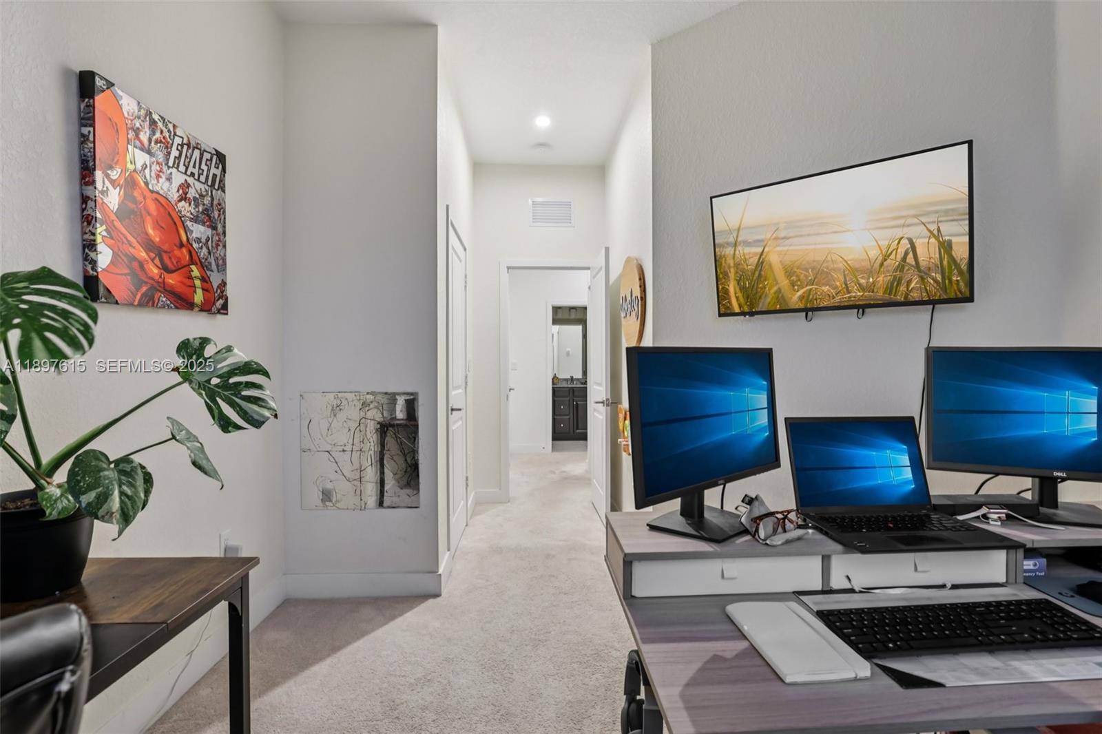 23291 Southwest 110th Court Homestead, FL 33032 - Photo 37 of 41 a living room with furniture and a flat screen tv