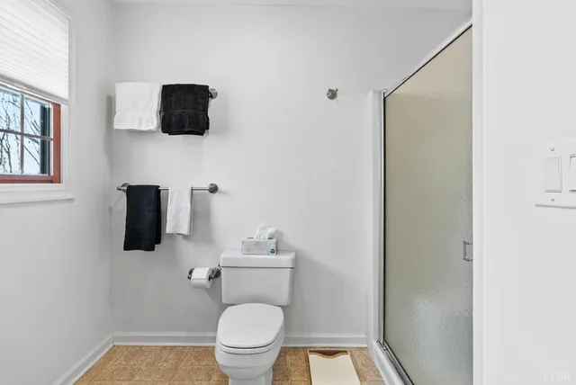 a stove top oven sitting inside of a kitchen