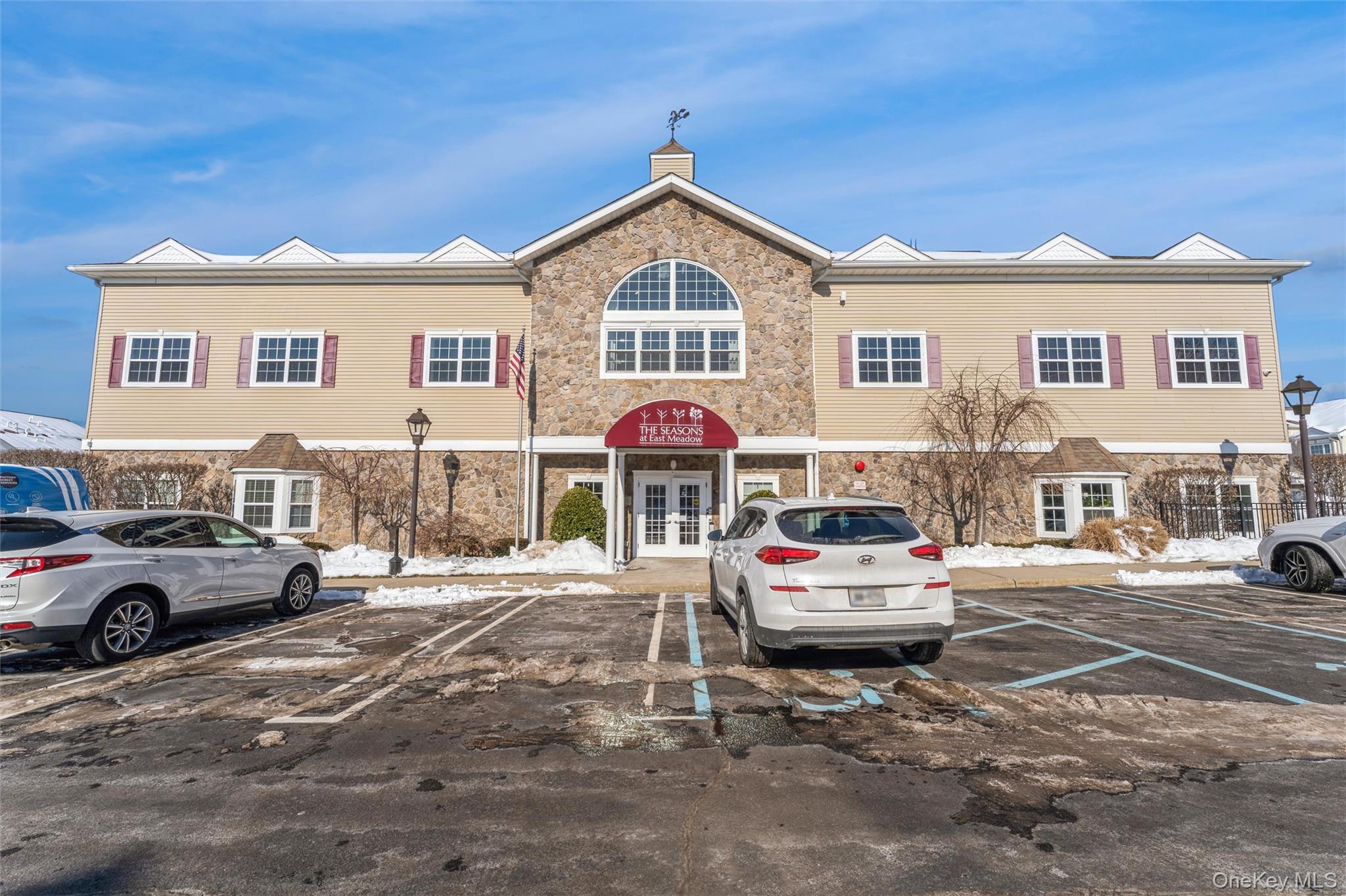 169 Spring Drive East Meadow, NY 11554 - Photo 18 of 33 a car parked in front of a house