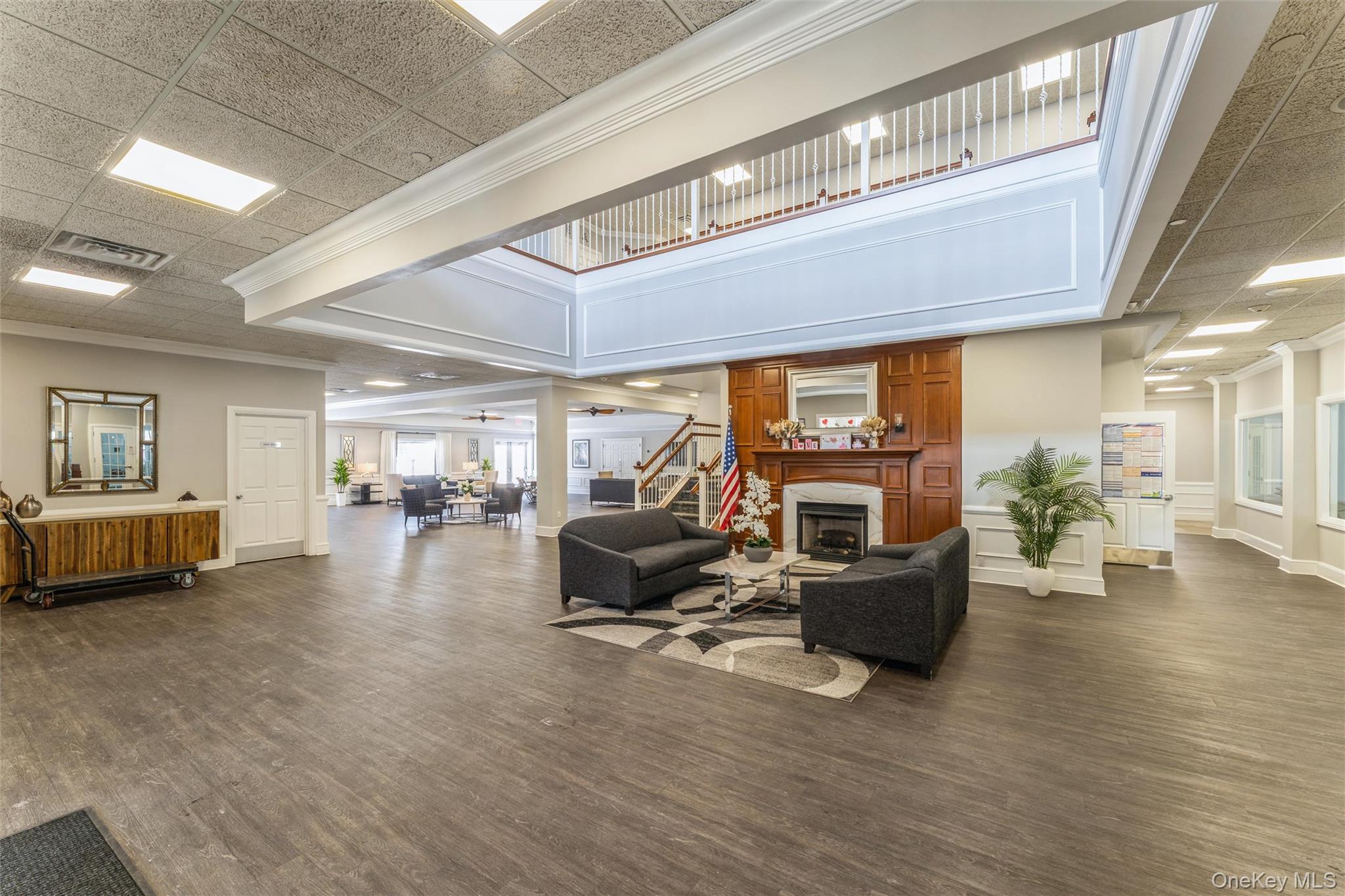 169 Spring Drive East Meadow, NY 11554 - Photo 20 of 33 a living room with furniture and a flat screen tv