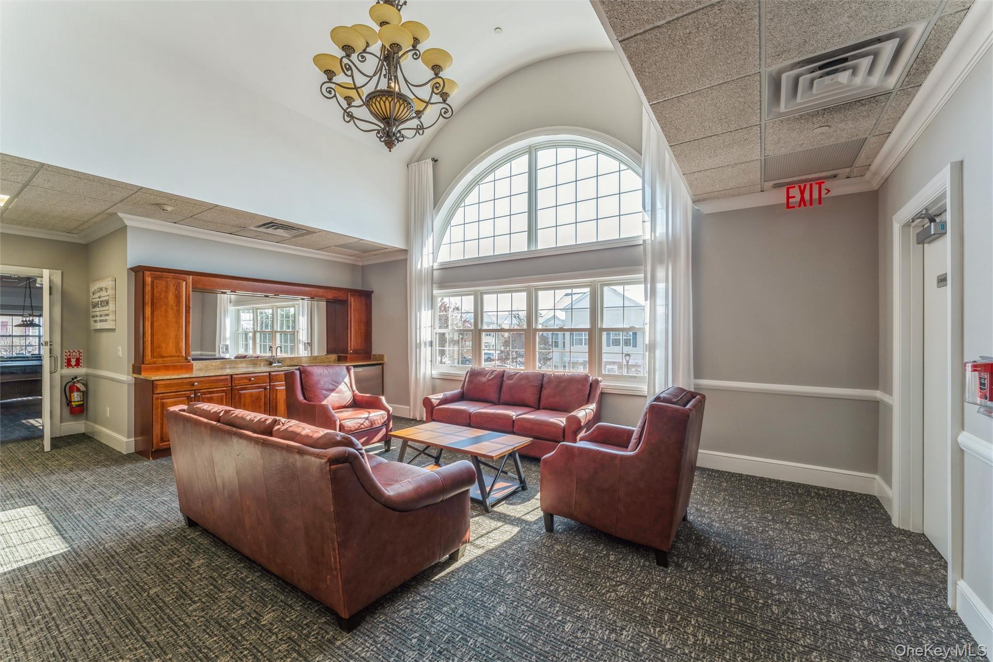169 Spring Drive East Meadow, NY 11554 - Photo 24 of 33 a living room with furniture and a large window