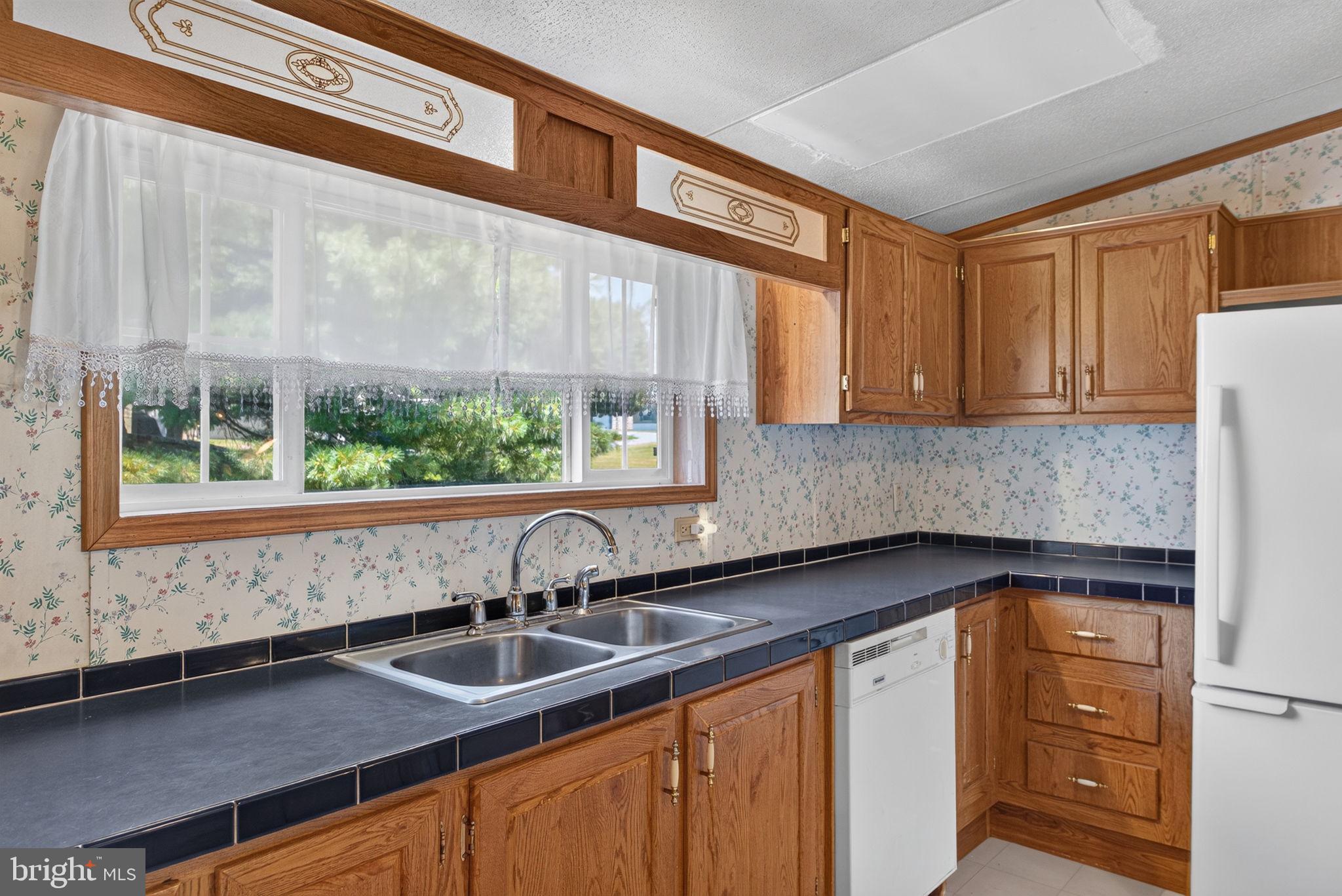 1910 Schubert Road, Unit 8 Bethel, PA 19507 - Photo 12 of 40 Cheerful sunlight streams through the windows
