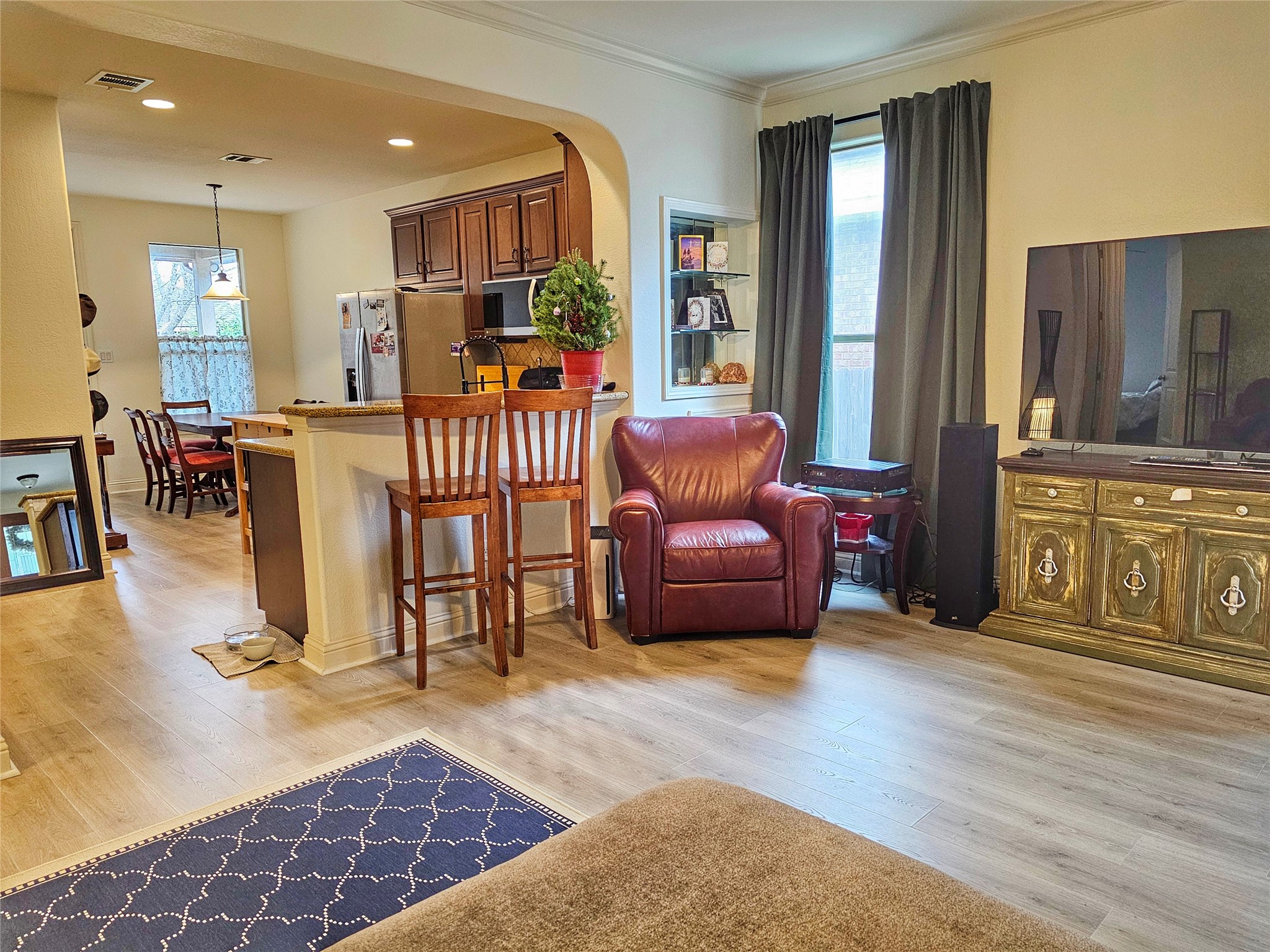 11508 Flushwing Drive Austin, TX 78754 - Photo 9 of 24 Living and dining into kitchen area