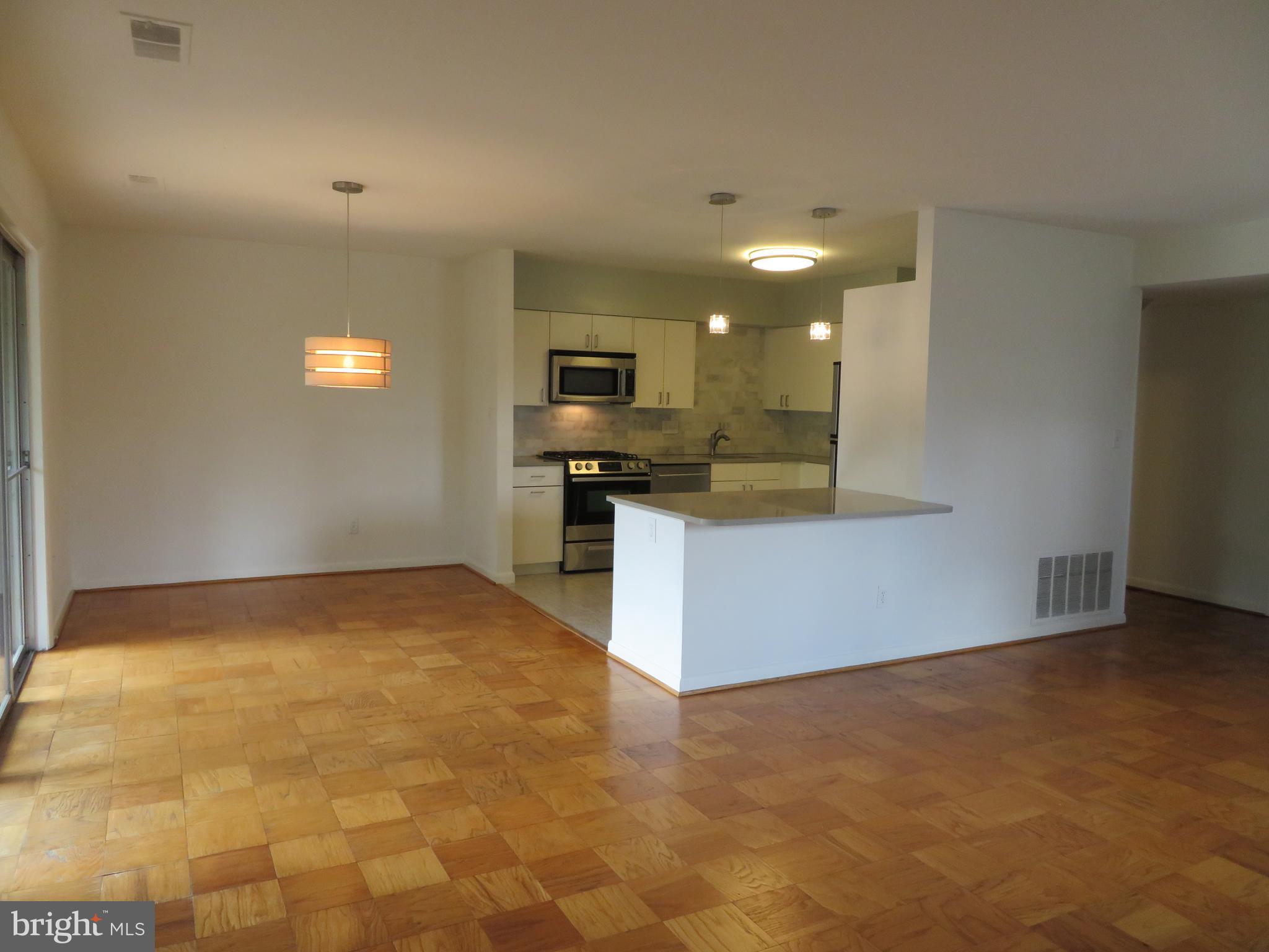 2 Cross Keys Road, Unit 2E Baltimore, MD 21210 - Photo 3 of 19 Kitchen opened up to living spaces