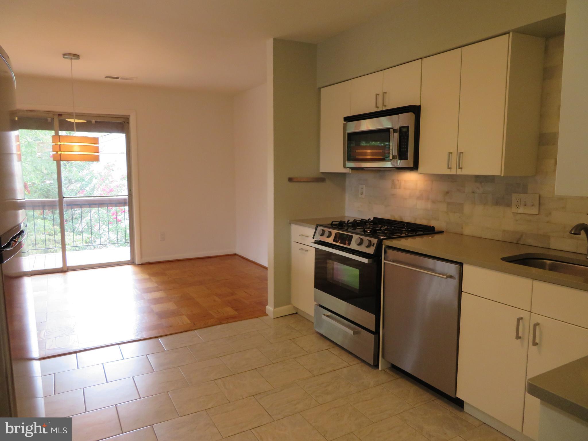 2 Cross Keys Road, Unit 2E Baltimore, MD 21210 - Photo 5 of 19 White Ikea cabinetry