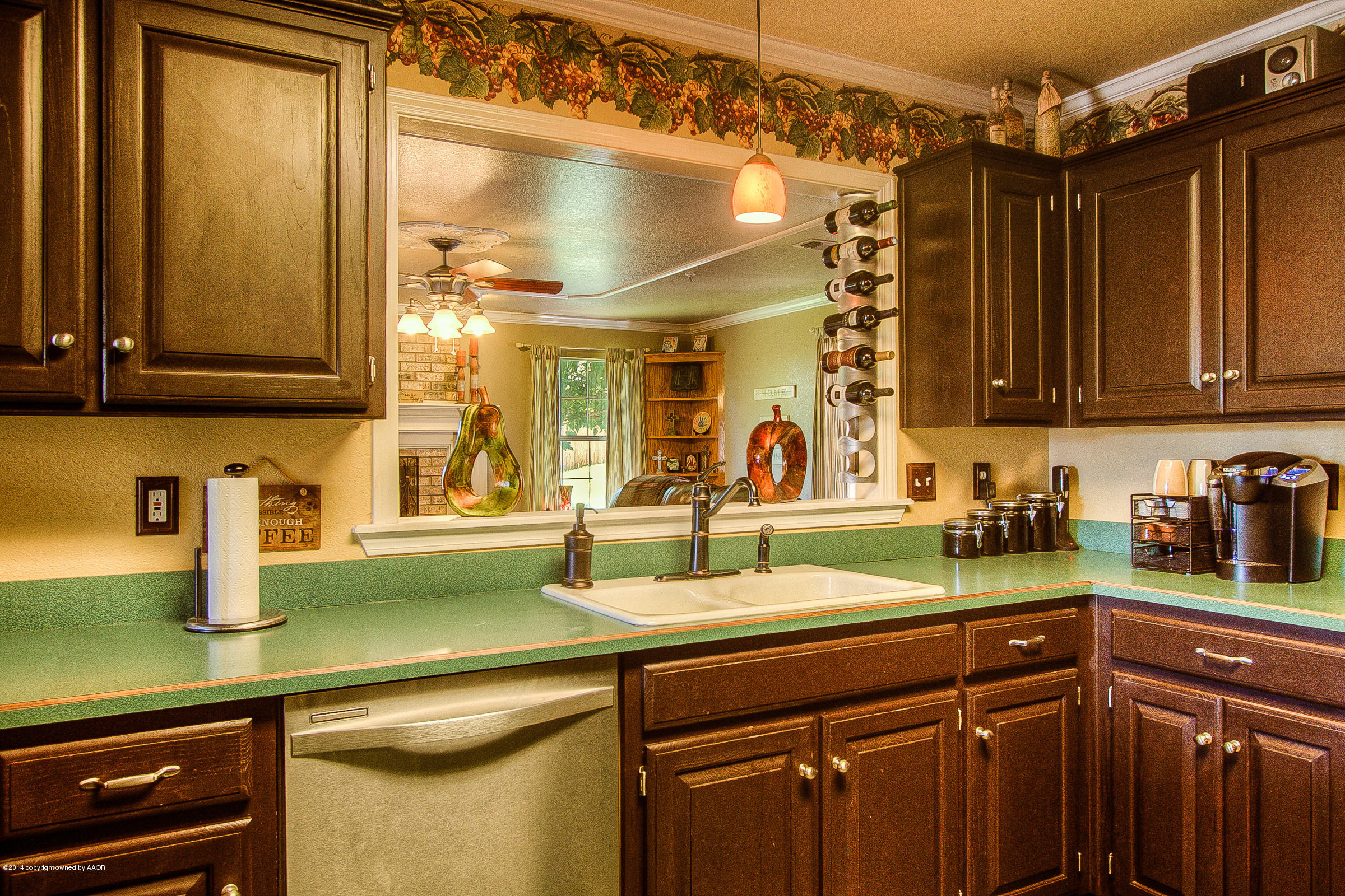 6804 Rio Lobo Street Amarillo, TX 79110 - Photo 8 of 23 a kitchen with a sink and cabinets
