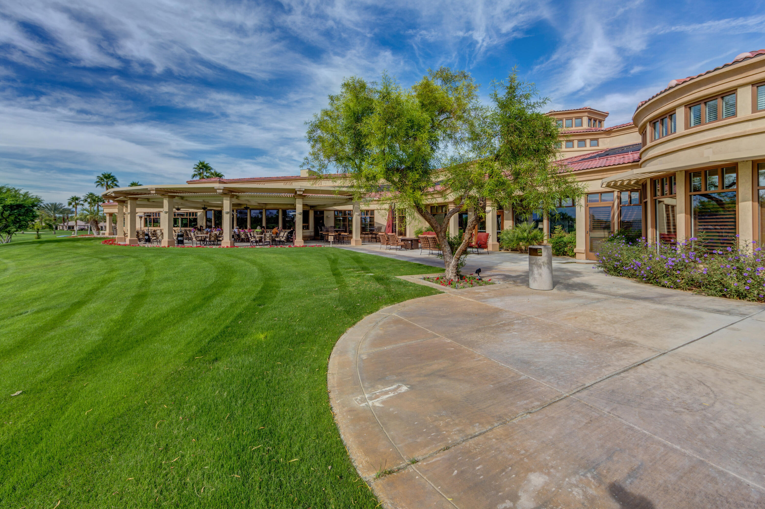 44357 Royal Lytham Drive Indio, CA 92201 - Photo 20 of 21 front view of a building with a yard