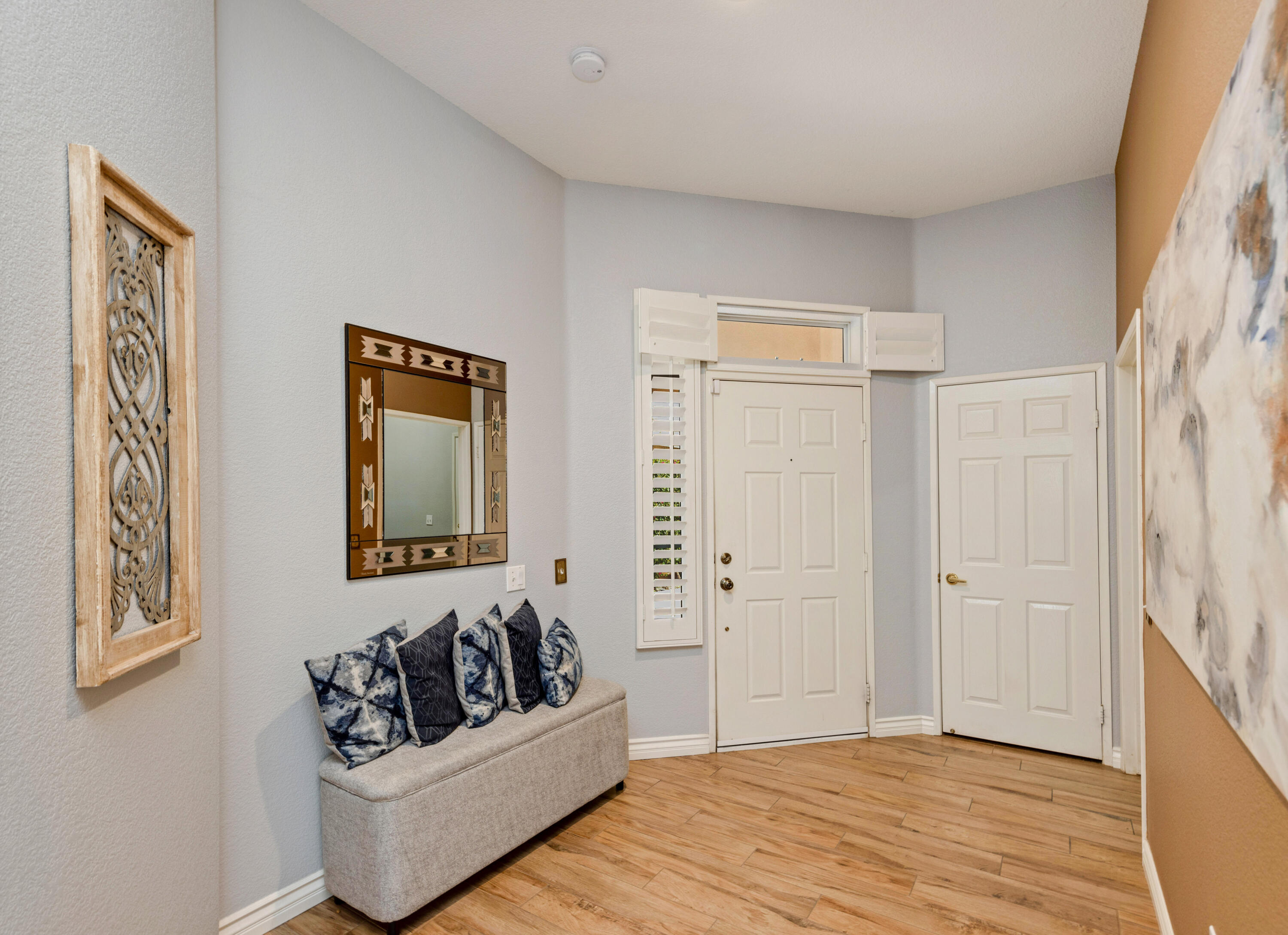 44357 Royal Lytham Drive Indio, CA 92201 - Photo 2 of 21 a living room with furniture and a wooden floor