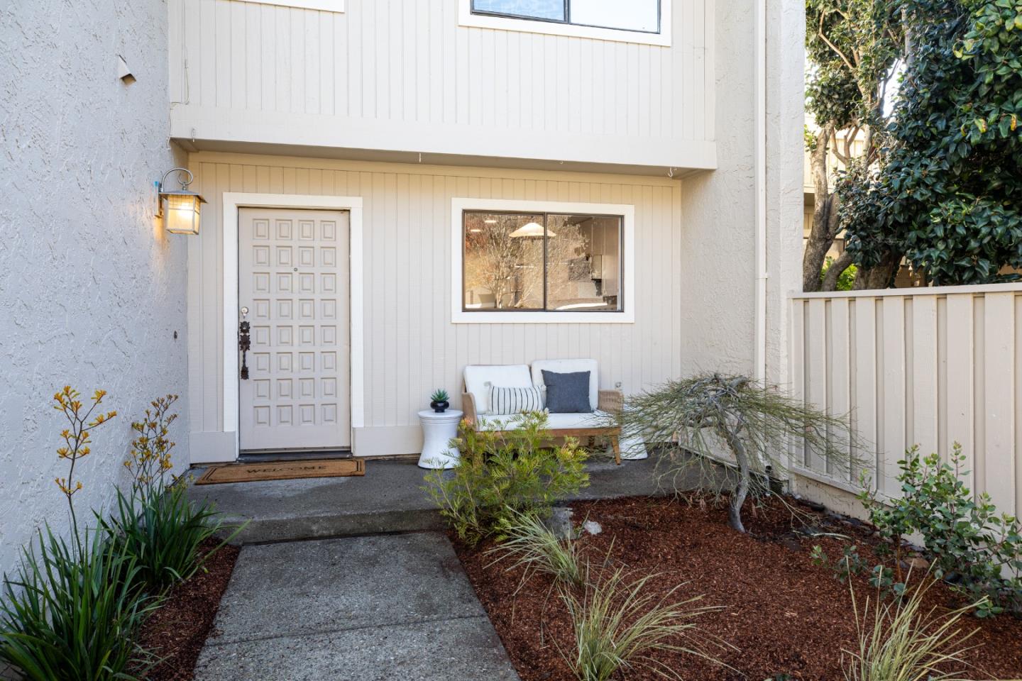 2464 Golf Links Circle Santa Clara, CA 95050 - Photo 2 of 45 a house with potted plants in front of door