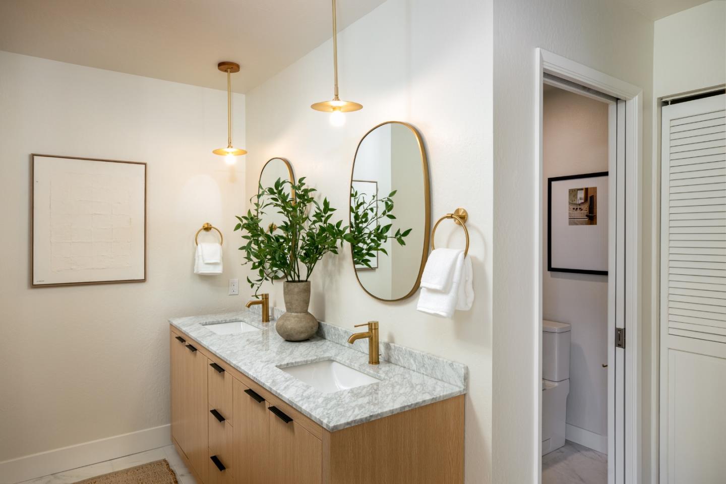 2464 Golf Links Circle Santa Clara, CA 95050 - Photo 25 of 45 a bathroom with a granite countertop sink a mirror and vanity