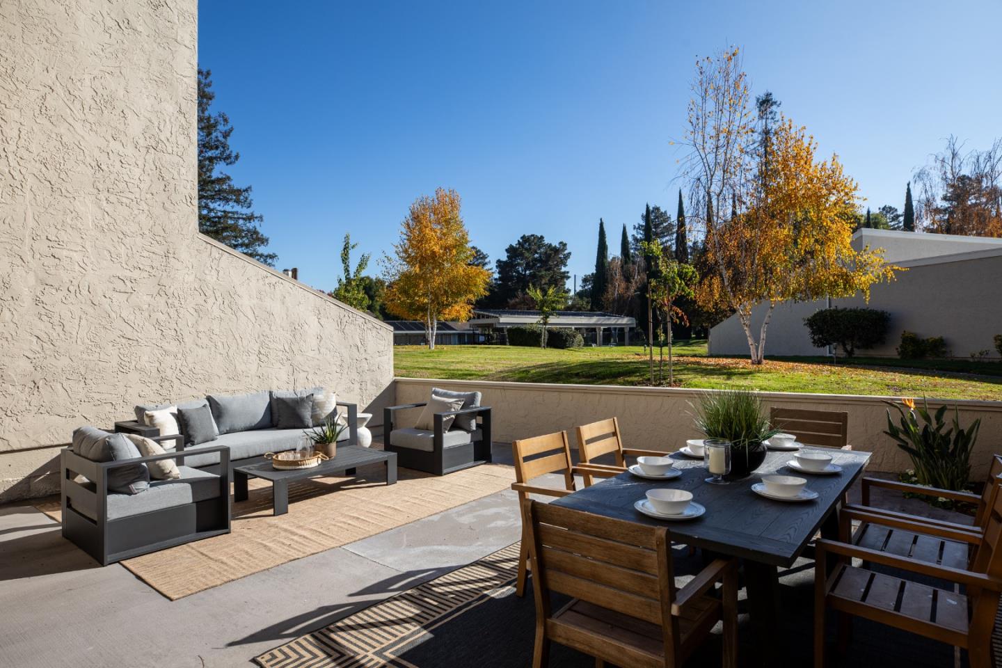 2464 Golf Links Circle Santa Clara, CA 95050 - Photo 31 of 45 a view of a patio with table and chairs couches with wooden floor and fence