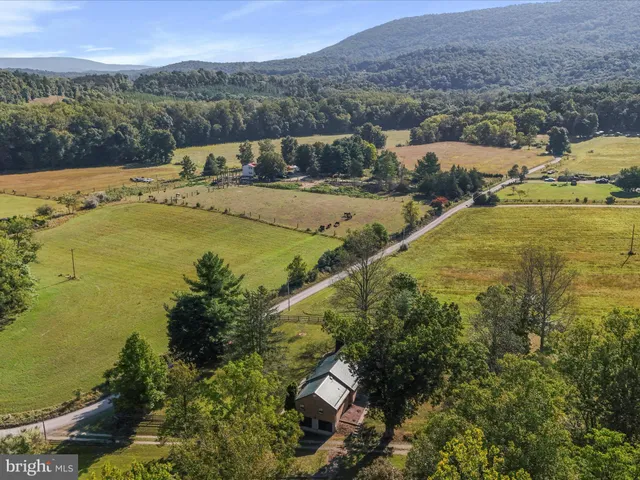 a picture of a bathroom with a shower