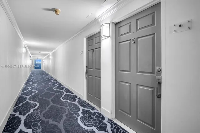 a view of a kitchen with a refrigerator and a stove top oven