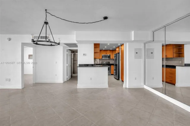 a view of a balcony with furniture