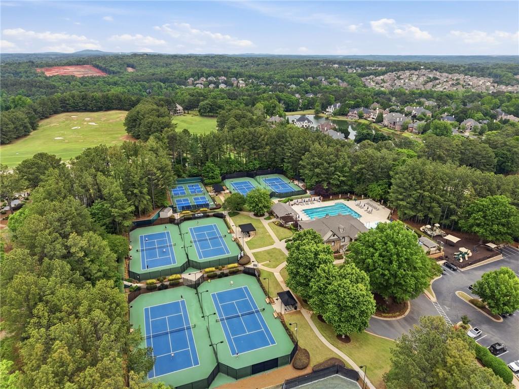 8340 Colonial Place Duluth, GA 30097 - Photo 67 of 74 an aerial view of residential houses with outdoor space and trees