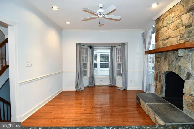 a bathroom with a sink a mirror and toilet