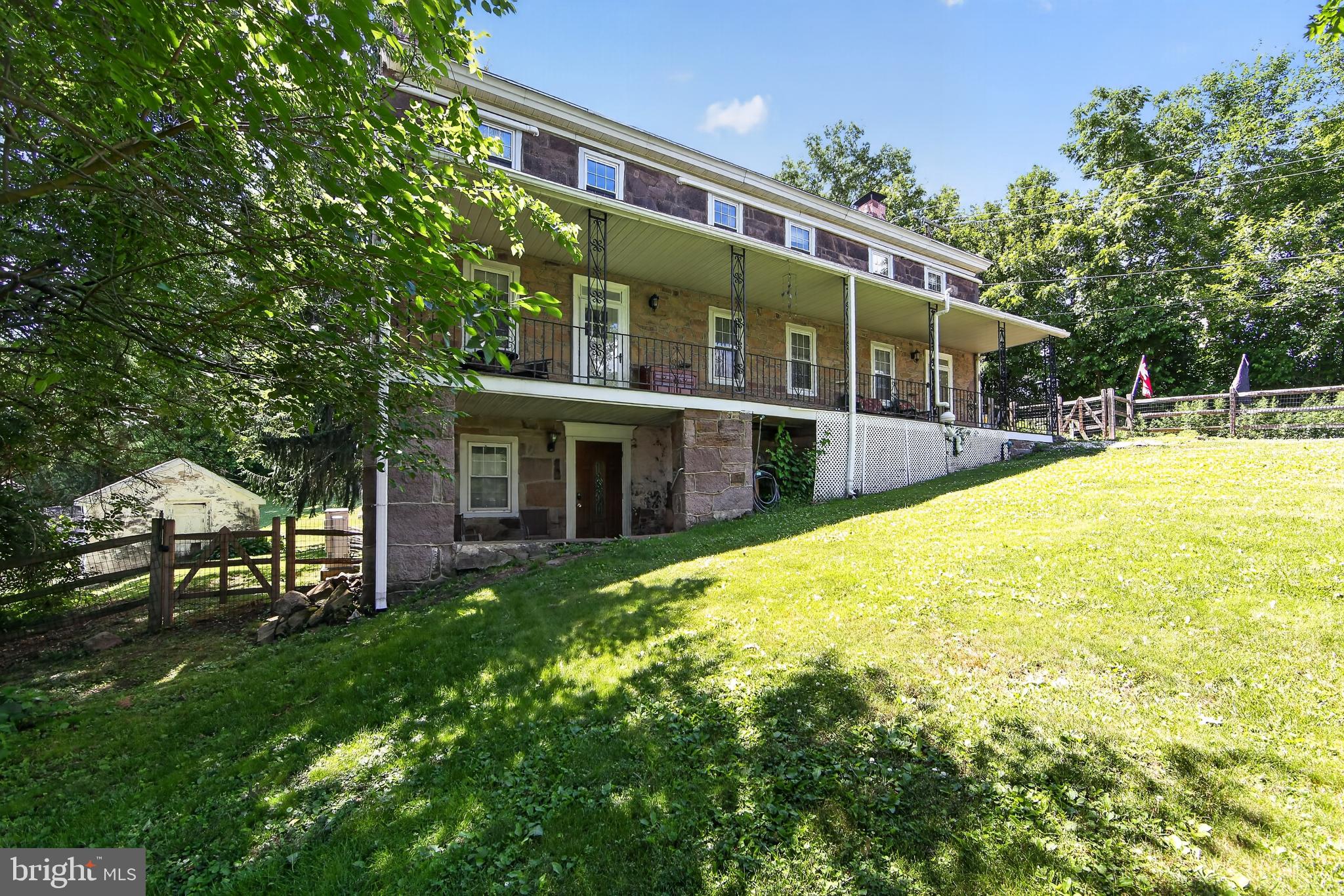 238 Brown Street Spring City, PA 19475 - Photo 4 of 57 Charming hillside retreat with lush greenery.
