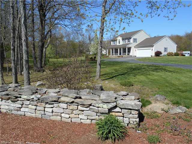 394 Green Hollow Road Killingly, CT 06239 - Photo 1 of 1 a view of a house with a yard