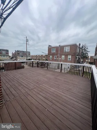 a view of a terrace with wooden floor