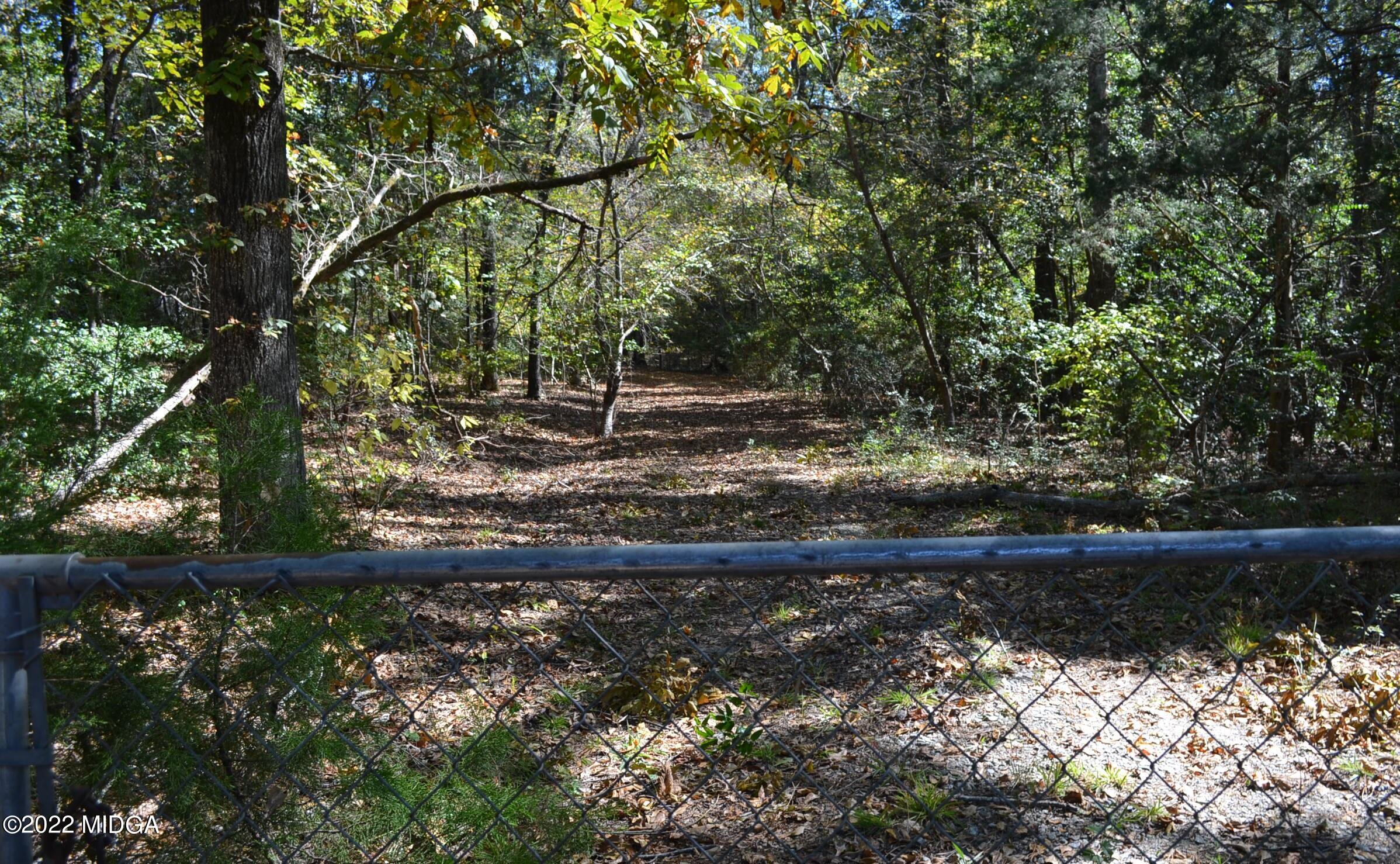 6514 Barfield Road Macon, GA 31216 - Photo 18 of 20 a view of a yard with wooden fence