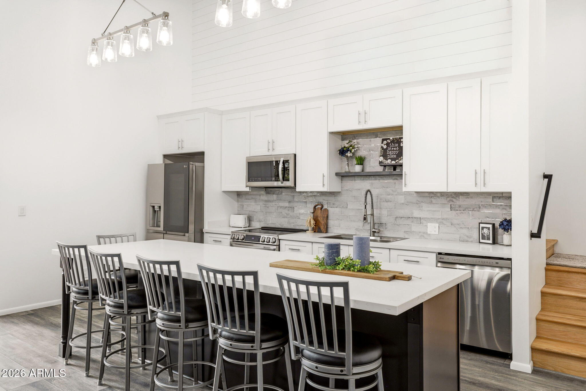 2287 Richenbacher Circle Overgaard, AZ 85933 - Photo 12 of 46 a kitchen with a dining table and chairs