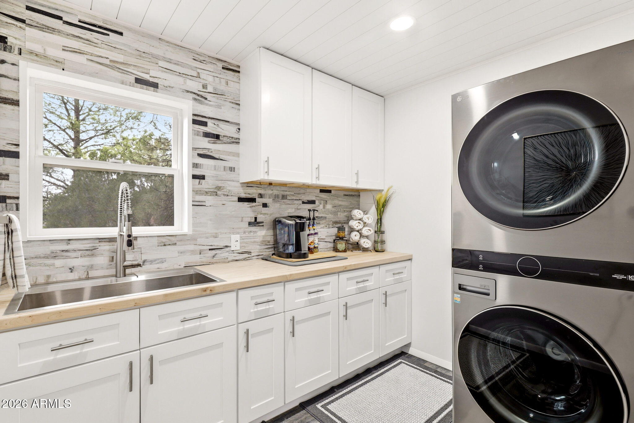 2287 Richenbacher Circle Overgaard, AZ 85933 - Photo 18 of 46 a kitchen with a sink and a stove