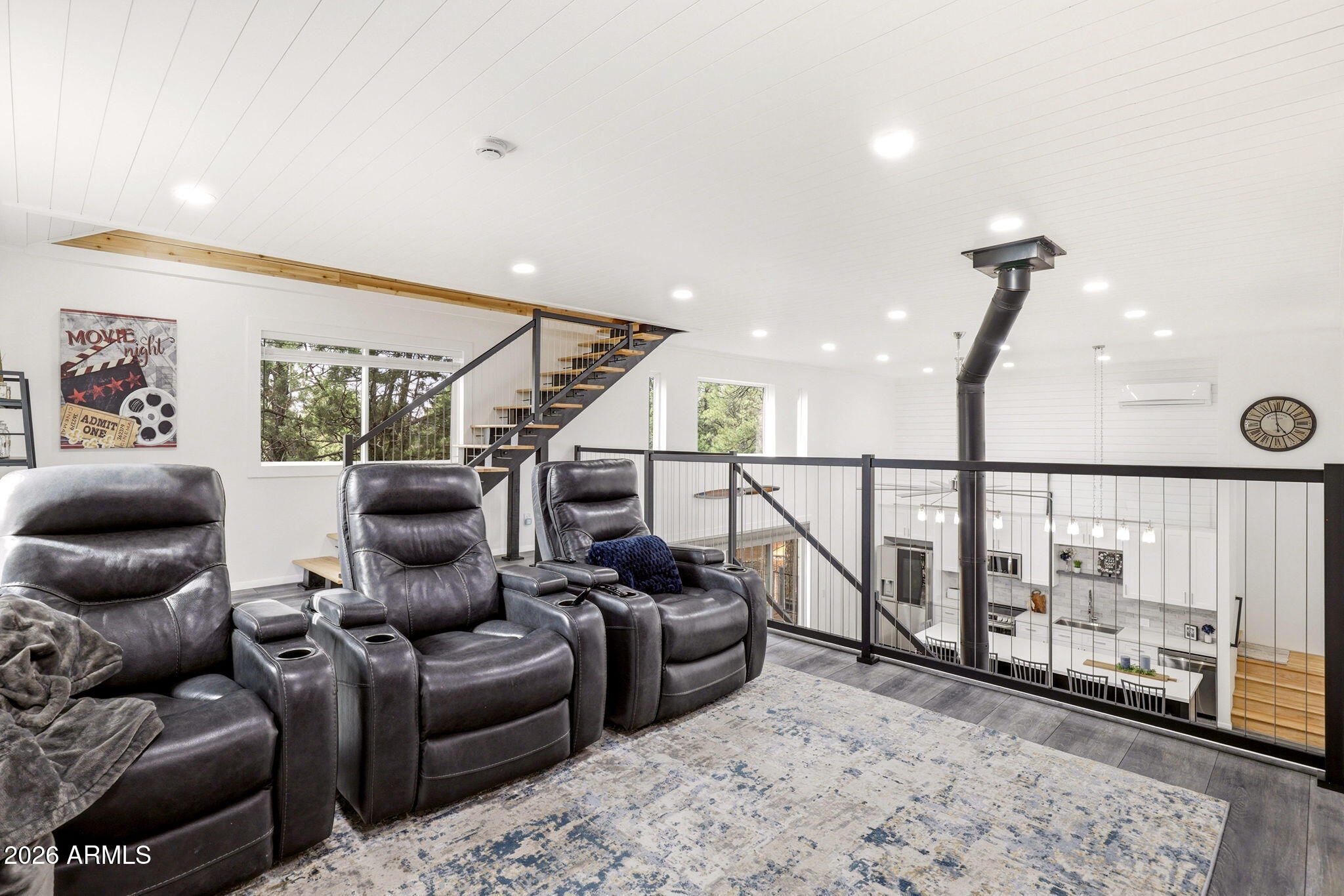 2287 Richenbacher Circle Overgaard, AZ 85933 - Photo 21 of 46 a living room with furniture and wooden floor