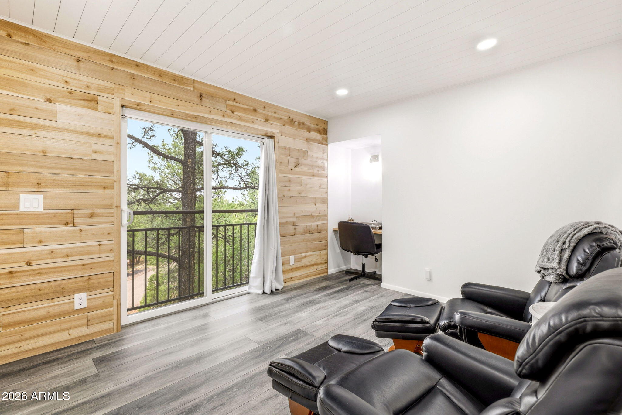 2287 Richenbacher Circle Overgaard, AZ 85933 - Photo 24 of 46 a living room with furniture and wooden floor