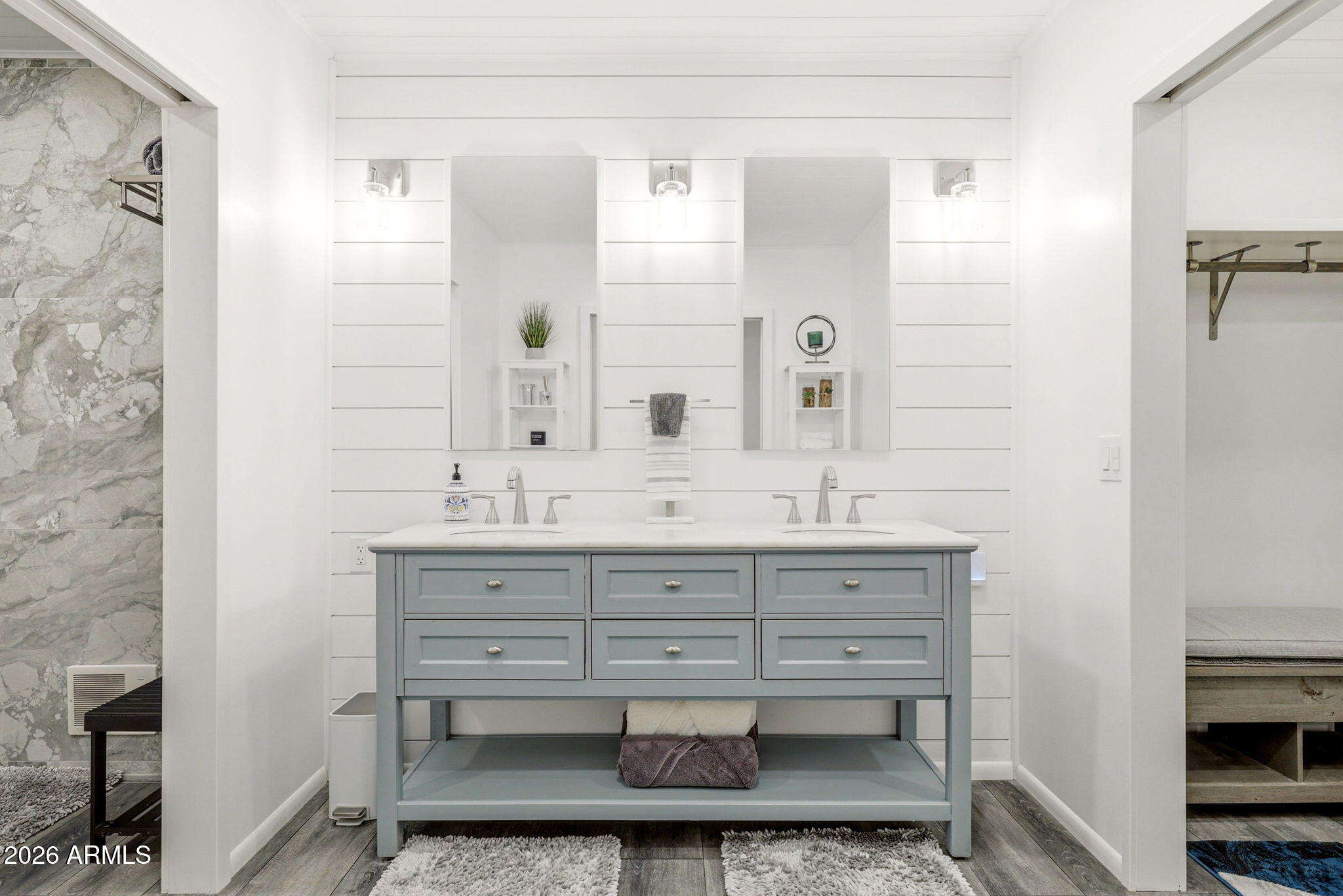 2287 Richenbacher Circle Overgaard, AZ 85933 - Photo 28 of 46 a bathroom with a sink a mirror and a shower