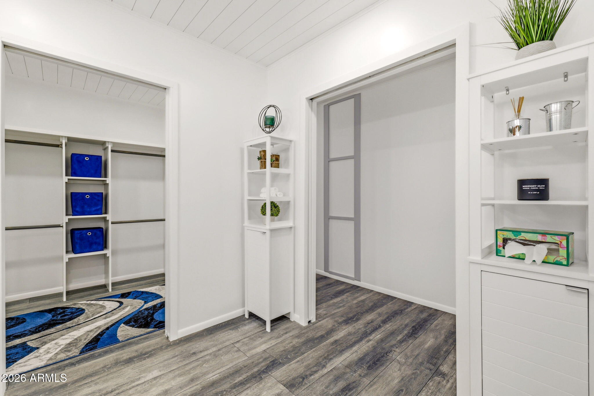 2287 Richenbacher Circle Overgaard, AZ 85933 - Photo 30 of 46 a view of room with hardwood floor and closet