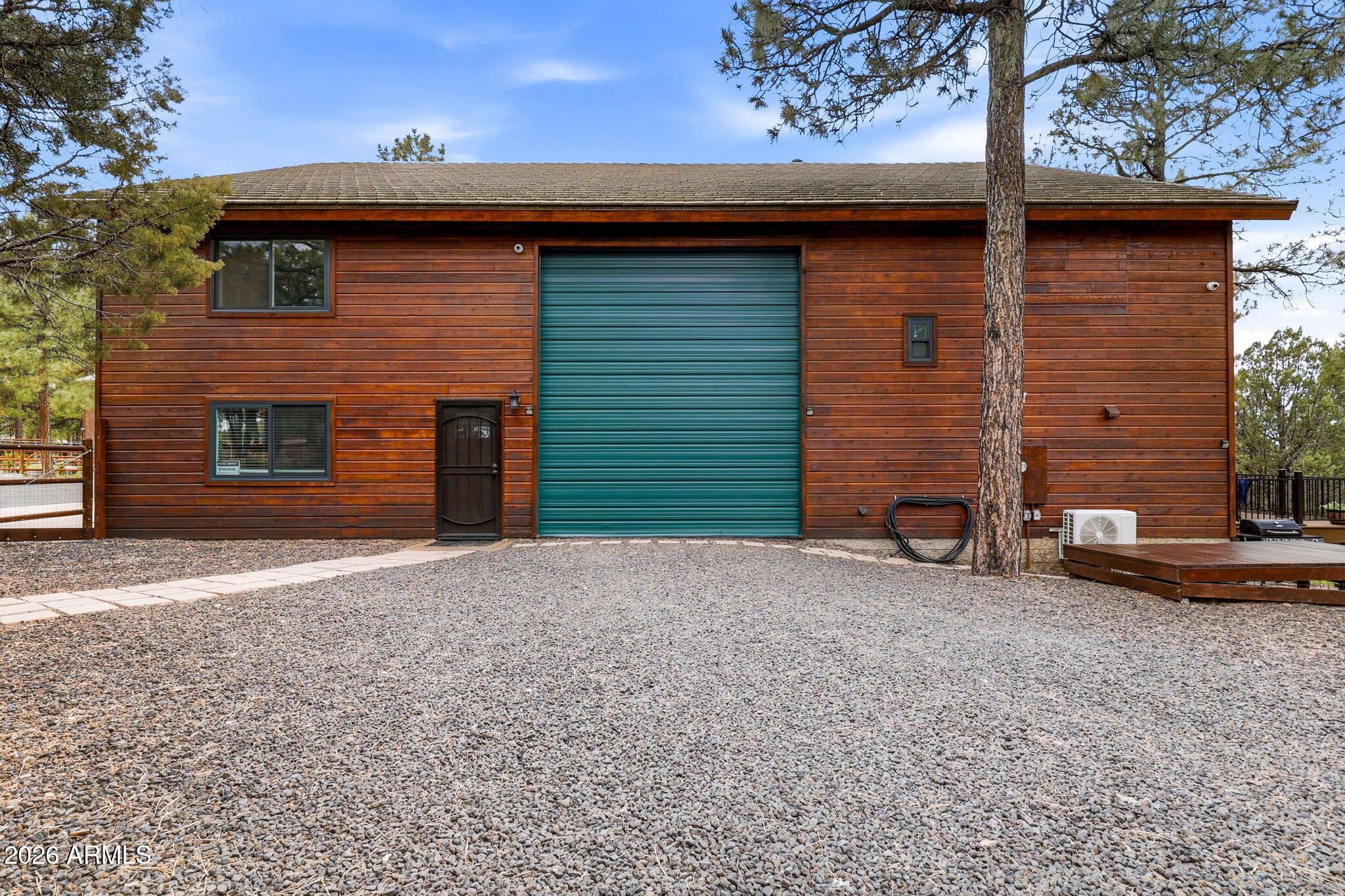 2287 Richenbacher Circle Overgaard, AZ 85933 - Photo 3 of 46 a front view of a house with a yard