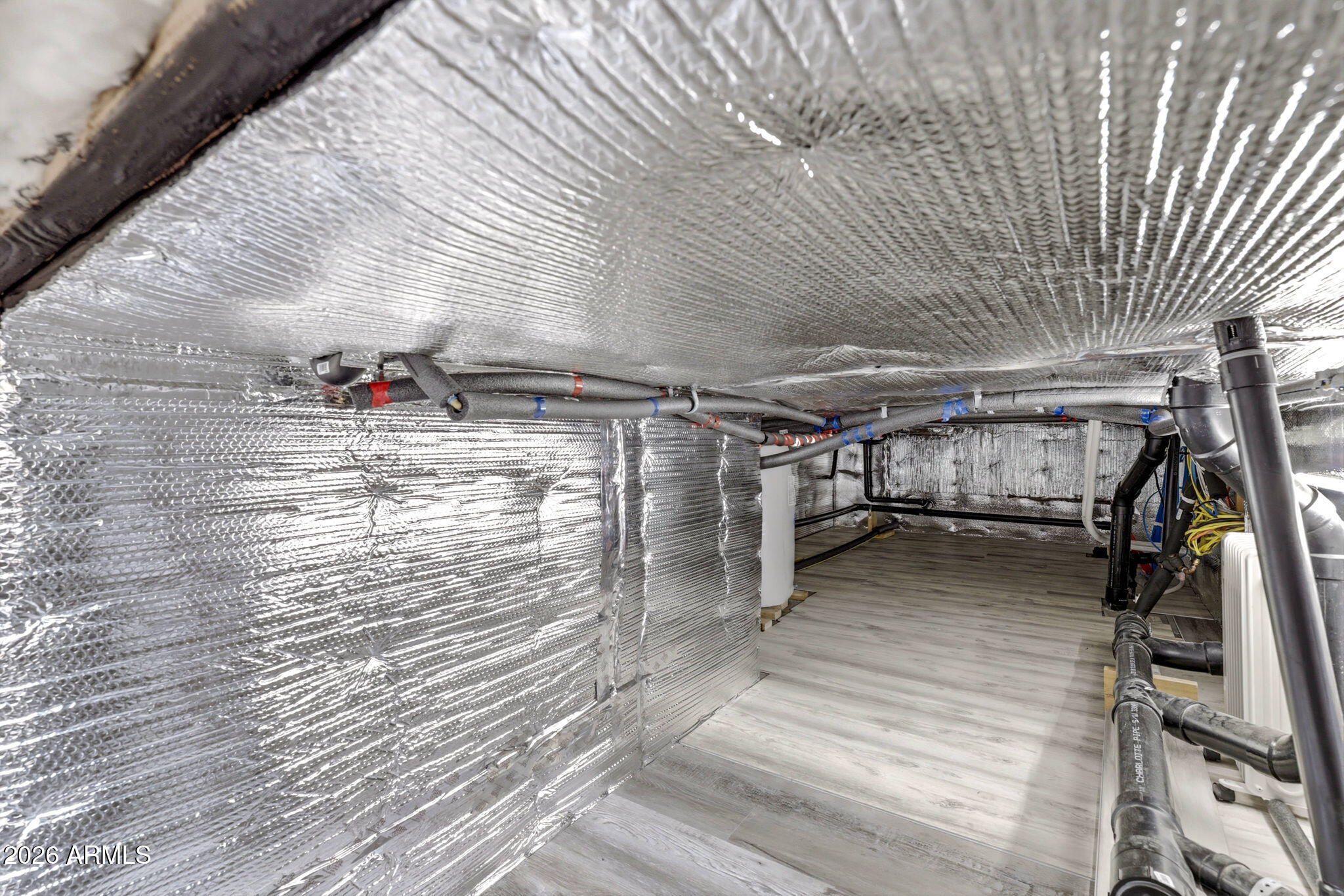 2287 Richenbacher Circle Overgaard, AZ 85933 - Photo 33 of 46 a view of a room with wooden floor