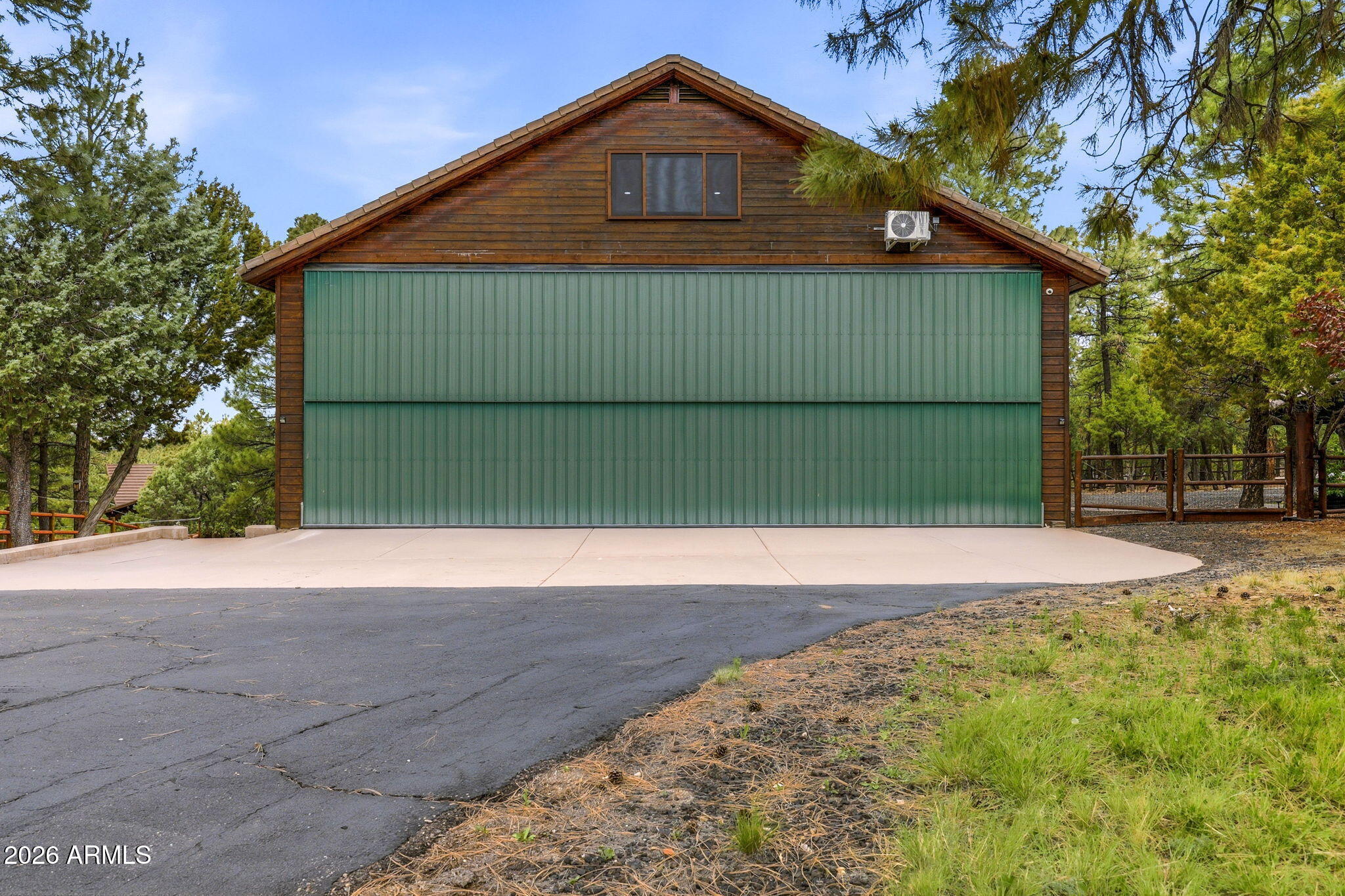 2287 Richenbacher Circle Overgaard, AZ 85933 - Photo 37 of 46 a front view of a house with a yard