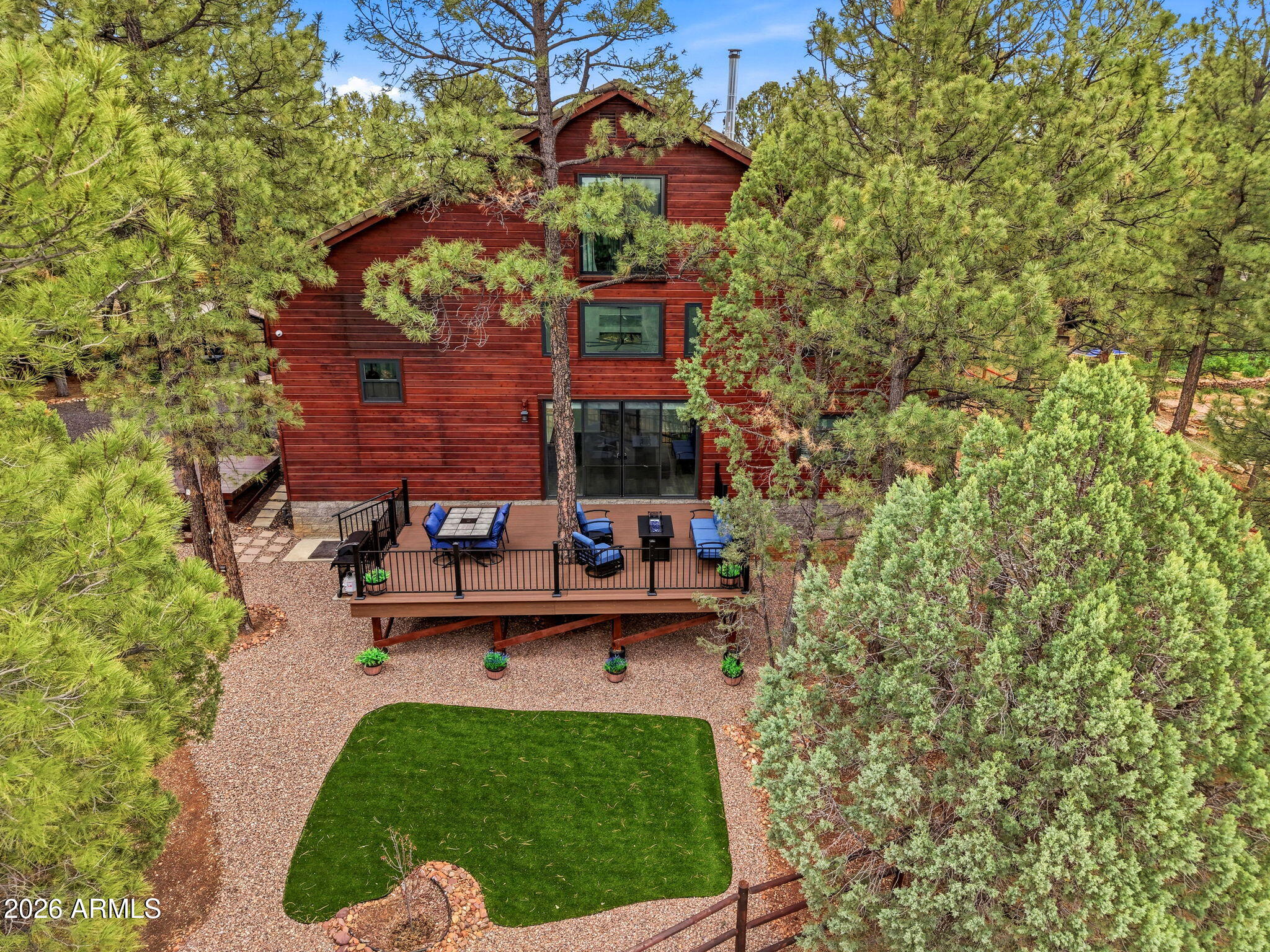 2287 Richenbacher Circle Overgaard, AZ 85933 - Photo 40 of 46 a balcony with table and chairs