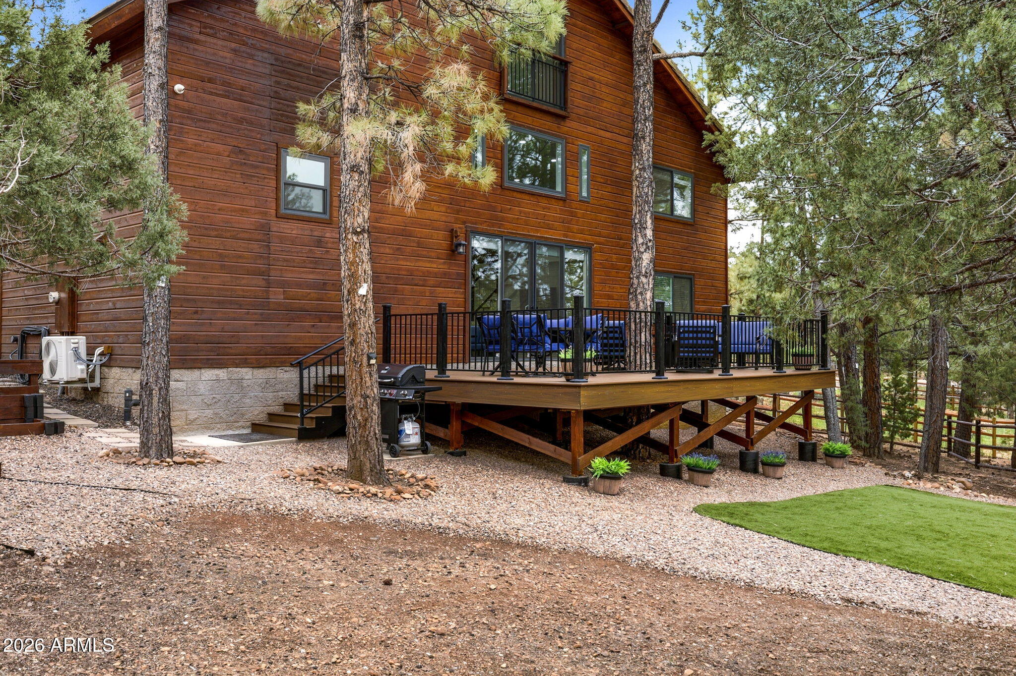 2287 Richenbacher Circle Overgaard, AZ 85933 - Photo 4 of 46 a view of a bench in a yard