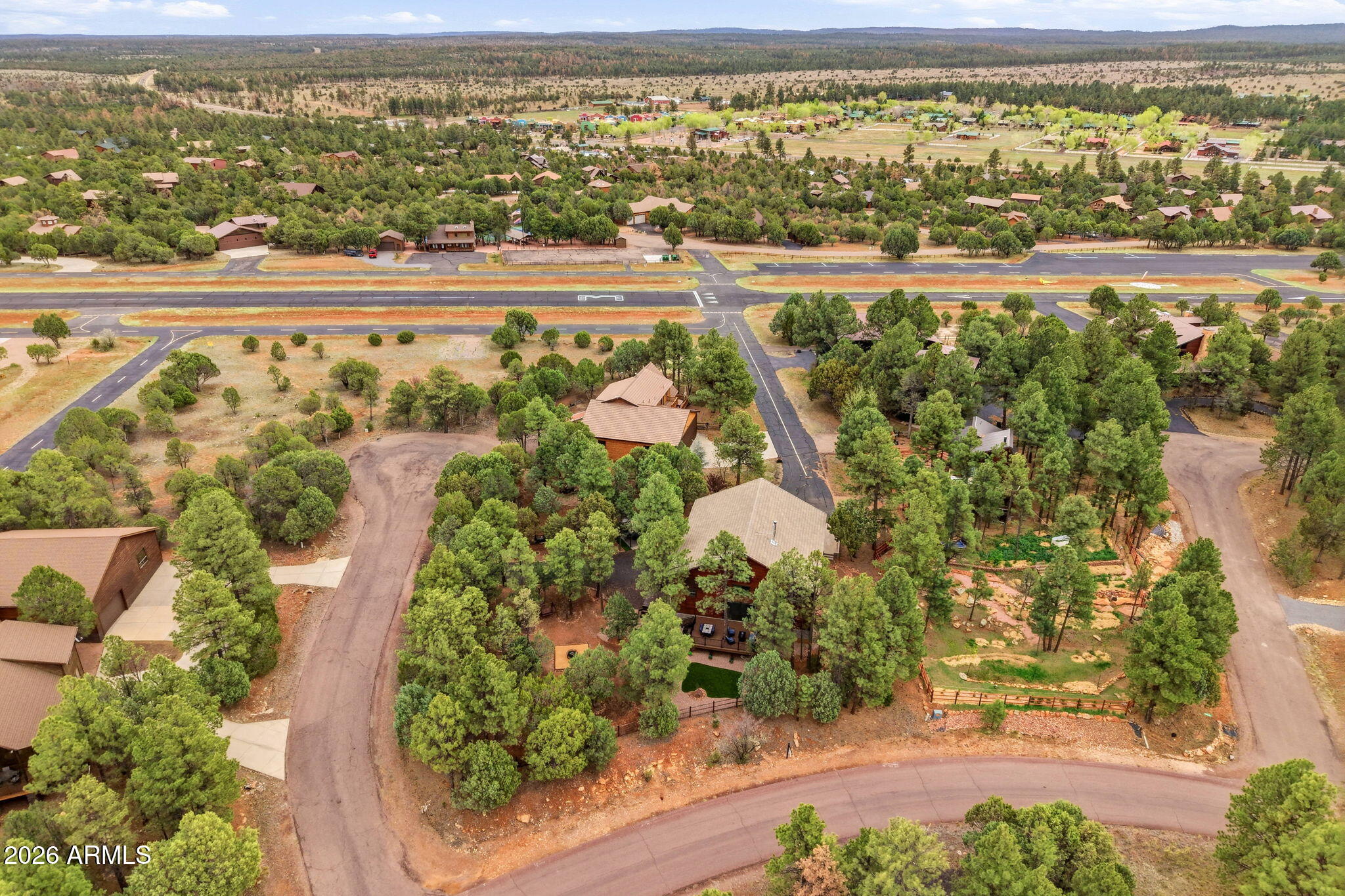 2287 Richenbacher Circle Overgaard, AZ 85933 - Photo 42 of 46 an aerial view of residential building and lake view