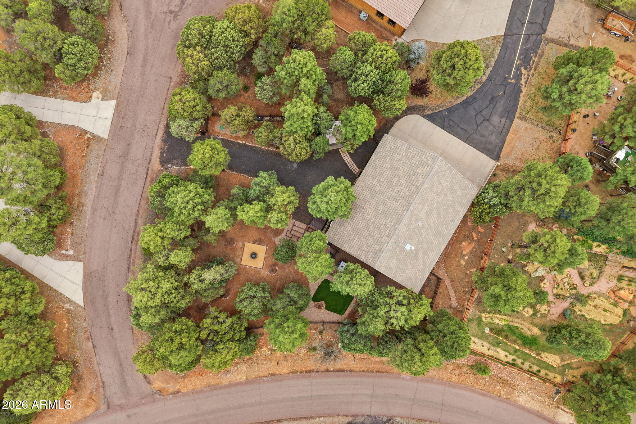 2287 Richenbacher Circle Overgaard, AZ 85933 - Photo 44 of 46 an aerial view of a house with a yard and plants