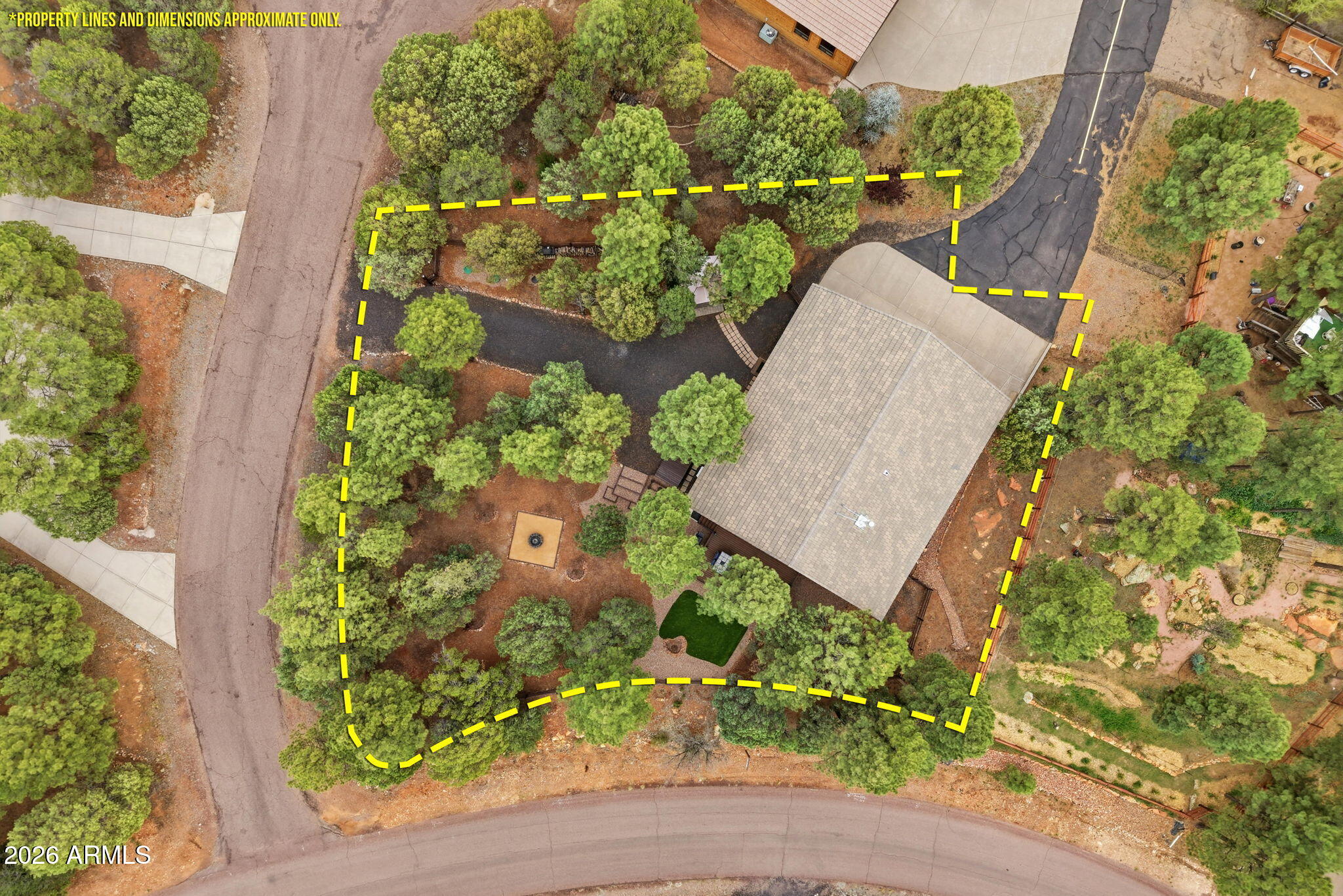 2287 Richenbacher Circle Overgaard, AZ 85933 - Photo 46 of 46 an aerial view of a house with a garden and plants